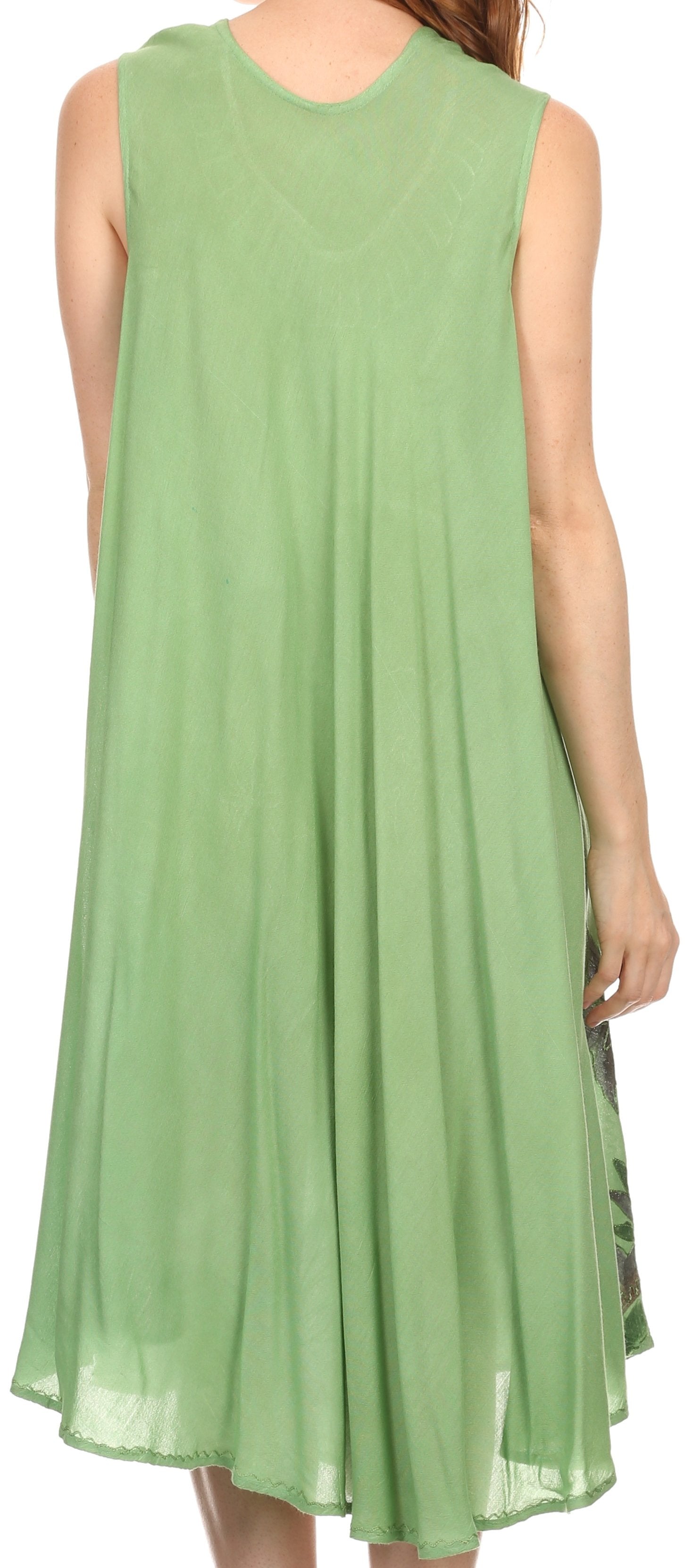 Green sleeveless dress worn by a person on a white background