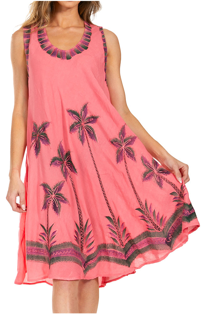 Pink dress with palm tree patterns on a white background