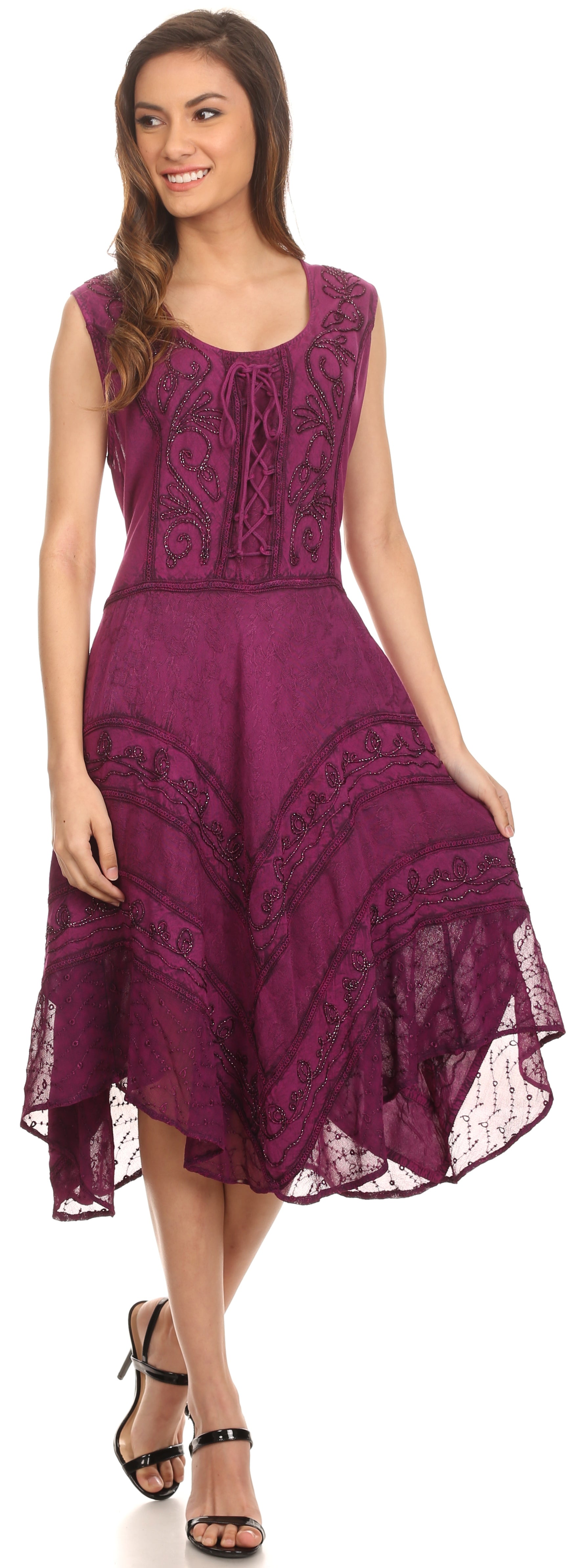 Woman wearing a purple lace dress on a white background