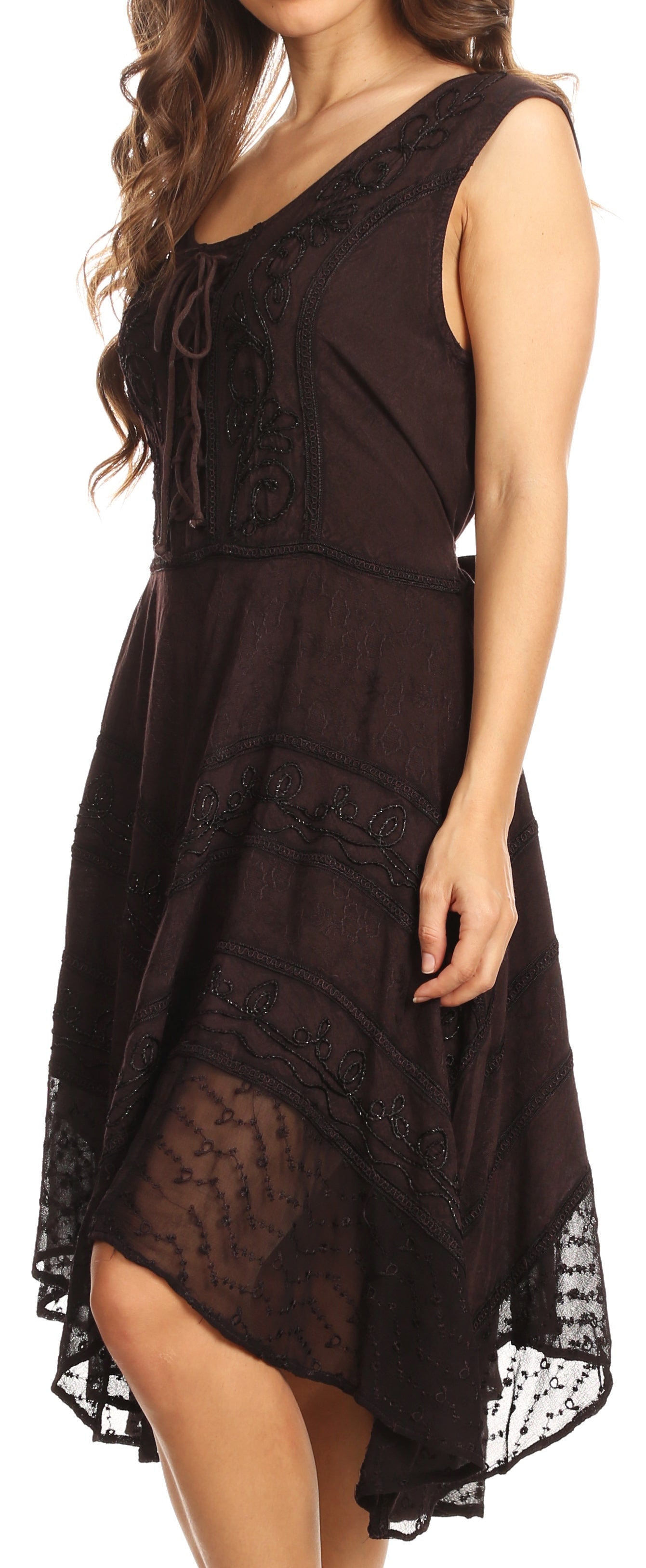 Black lace dress worn by a model on a white background