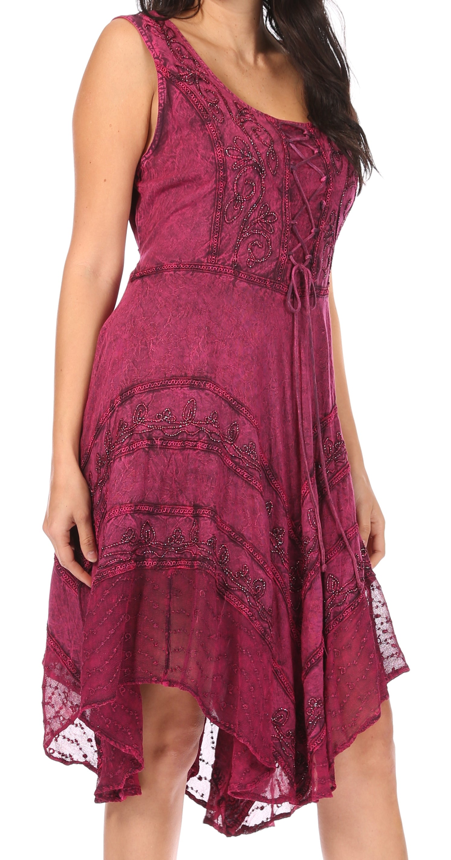 Woman wearing a pink lace dress on a white background