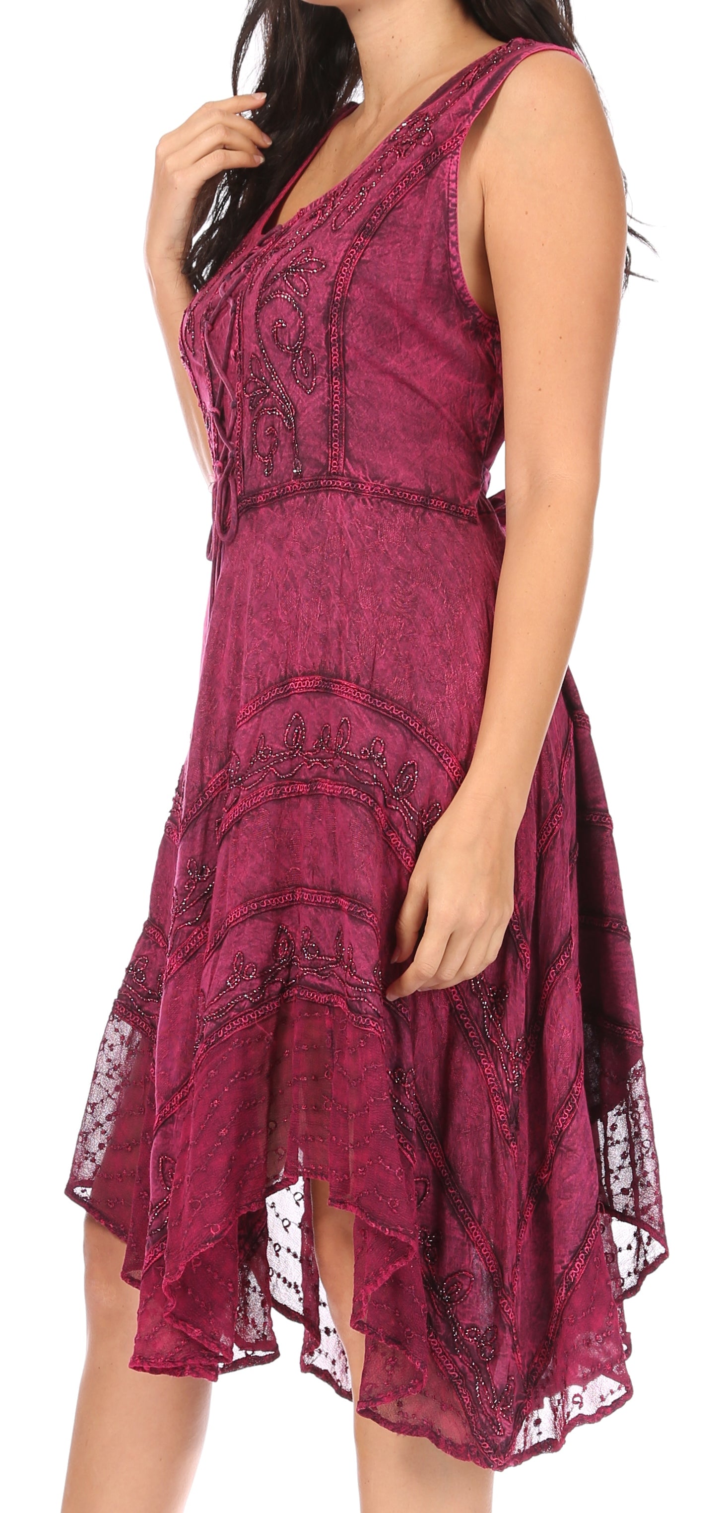 Woman wearing a burgundy lace dress on a white background