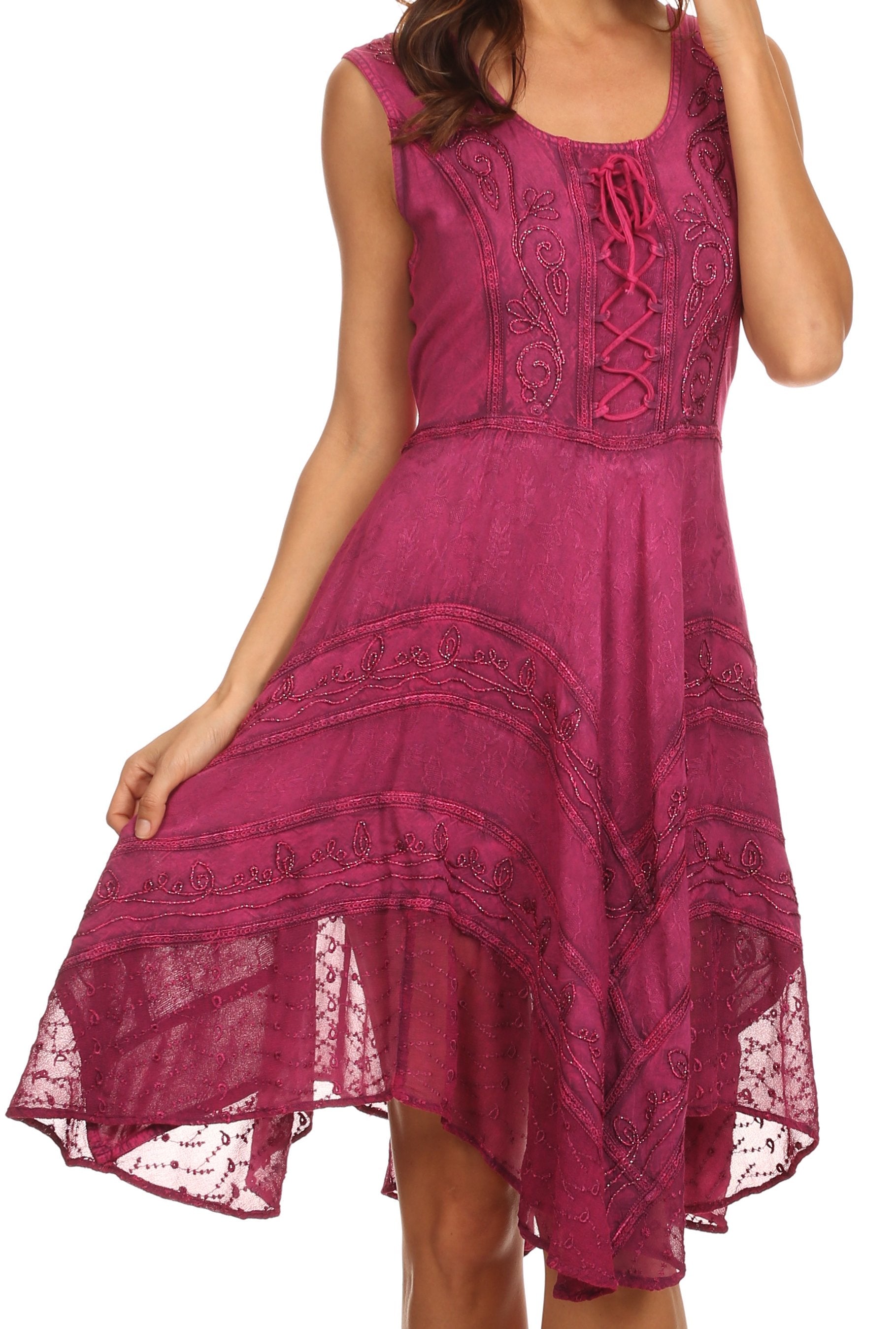 Pink dress with lace details on a white background