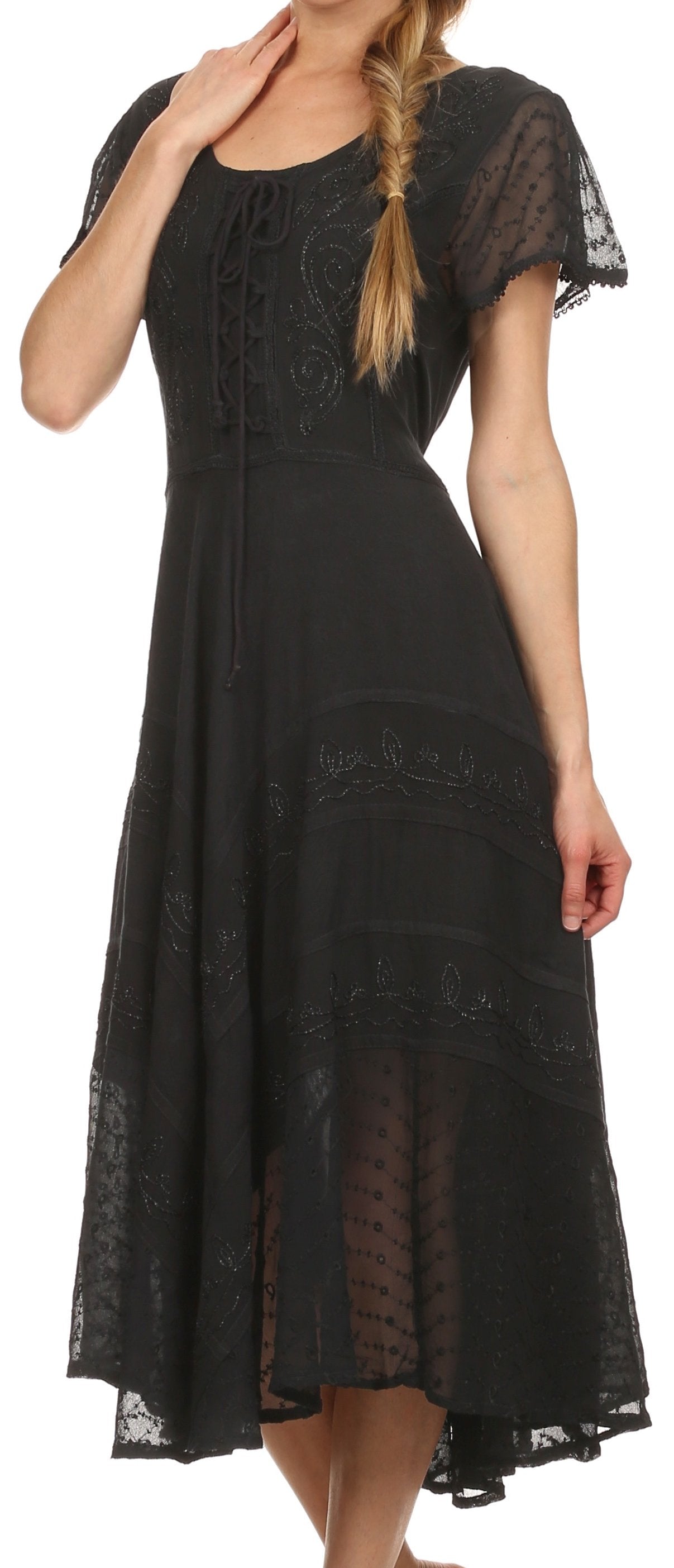 Black lace dress worn by a model on a white background
