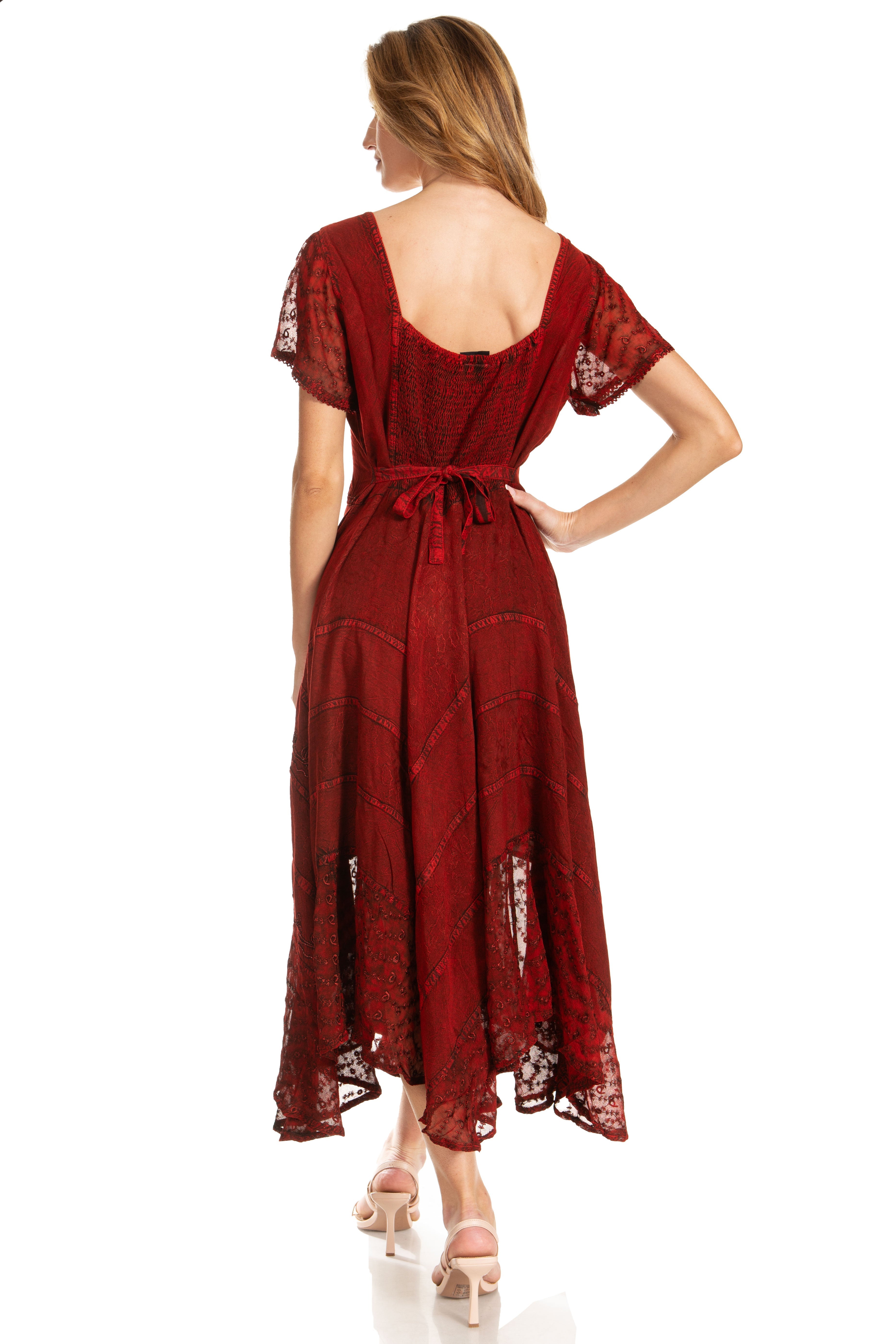 Woman wearing a red lace dress on a white background