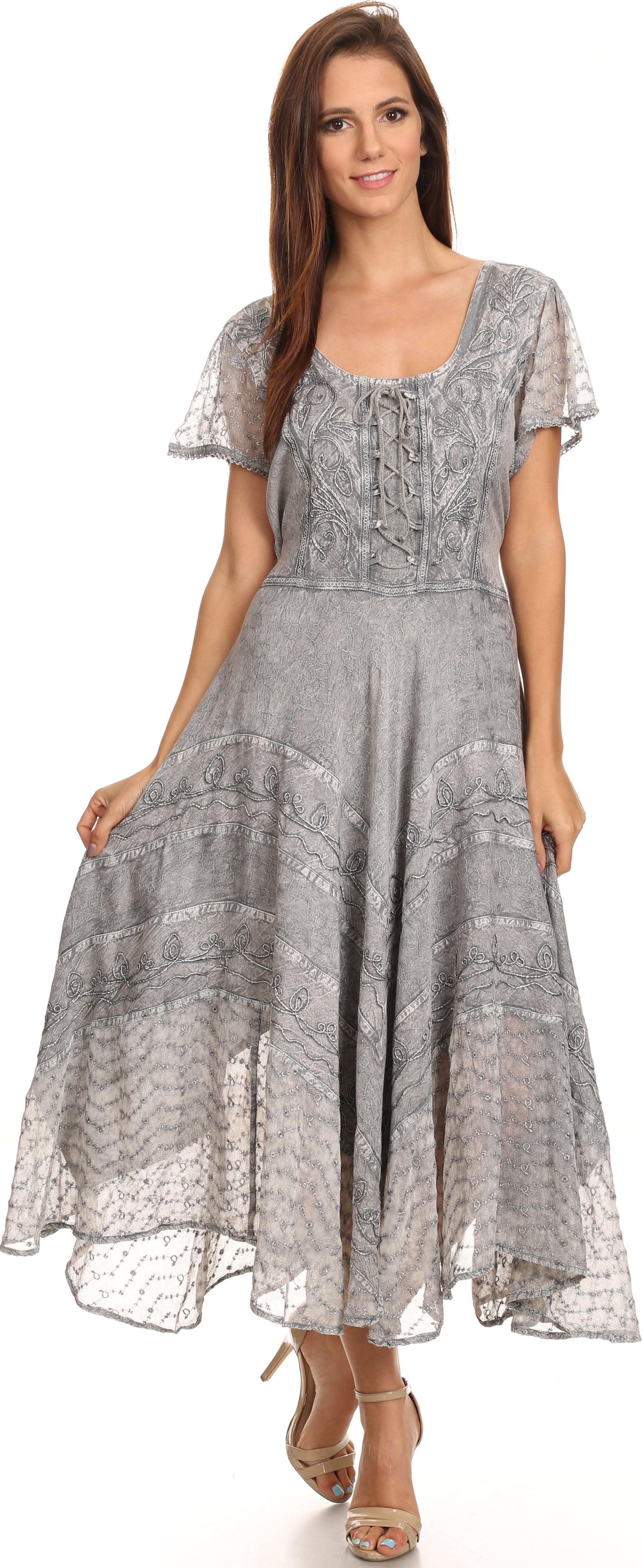 Woman wearing a gray lace dress on a white background