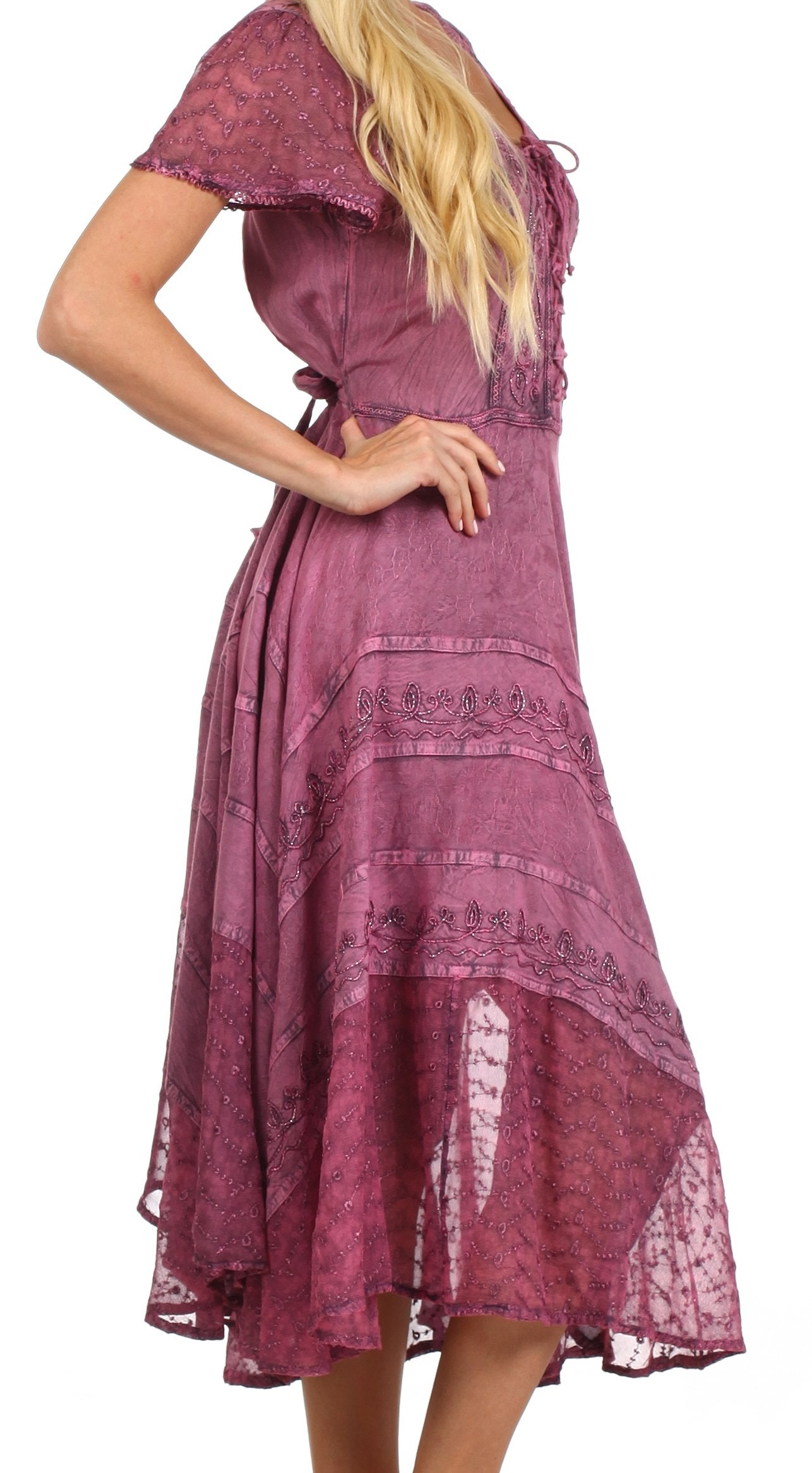 Purple lace dress worn by a person on a white background