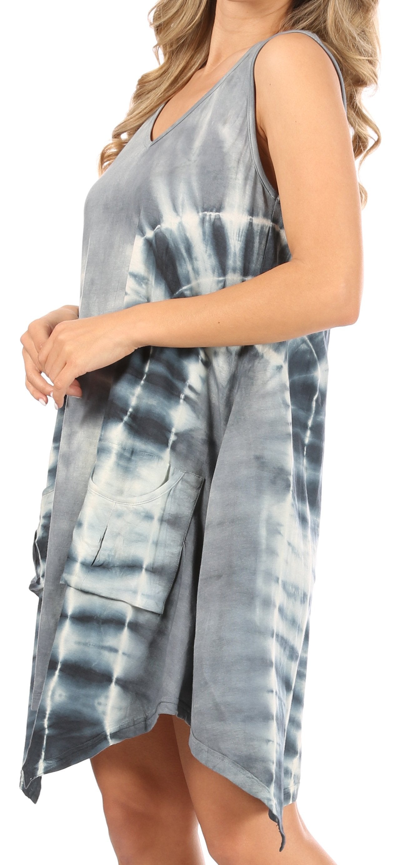 Woman wearing a sleeveless tie-dye dress with a white background