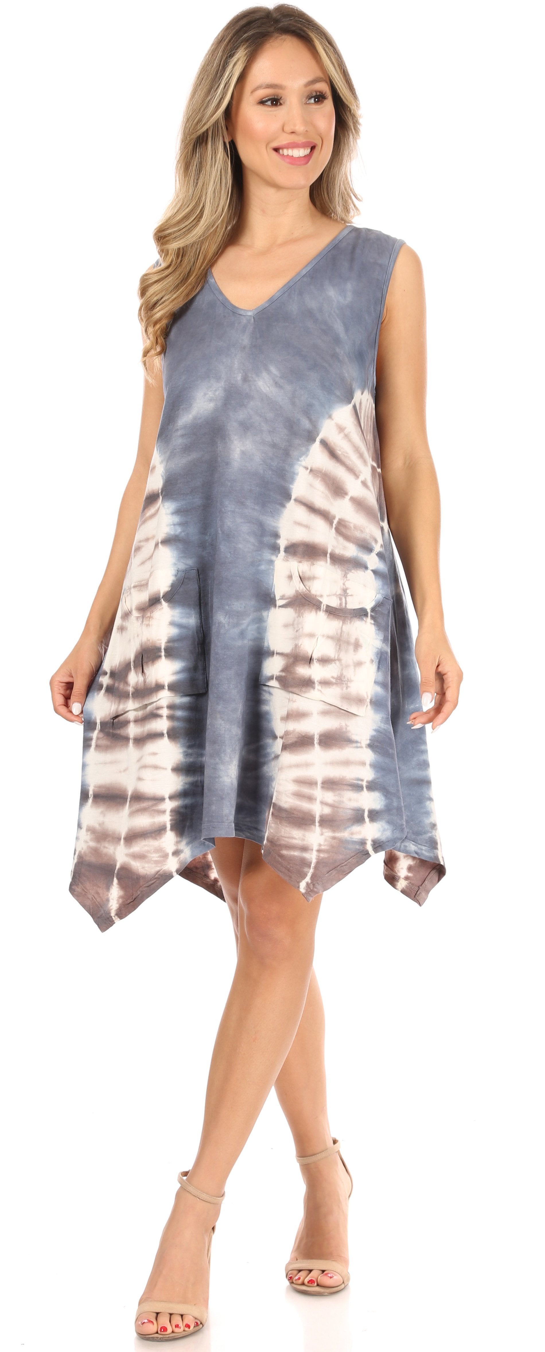 Woman wearing a tie-dye dress on a white background