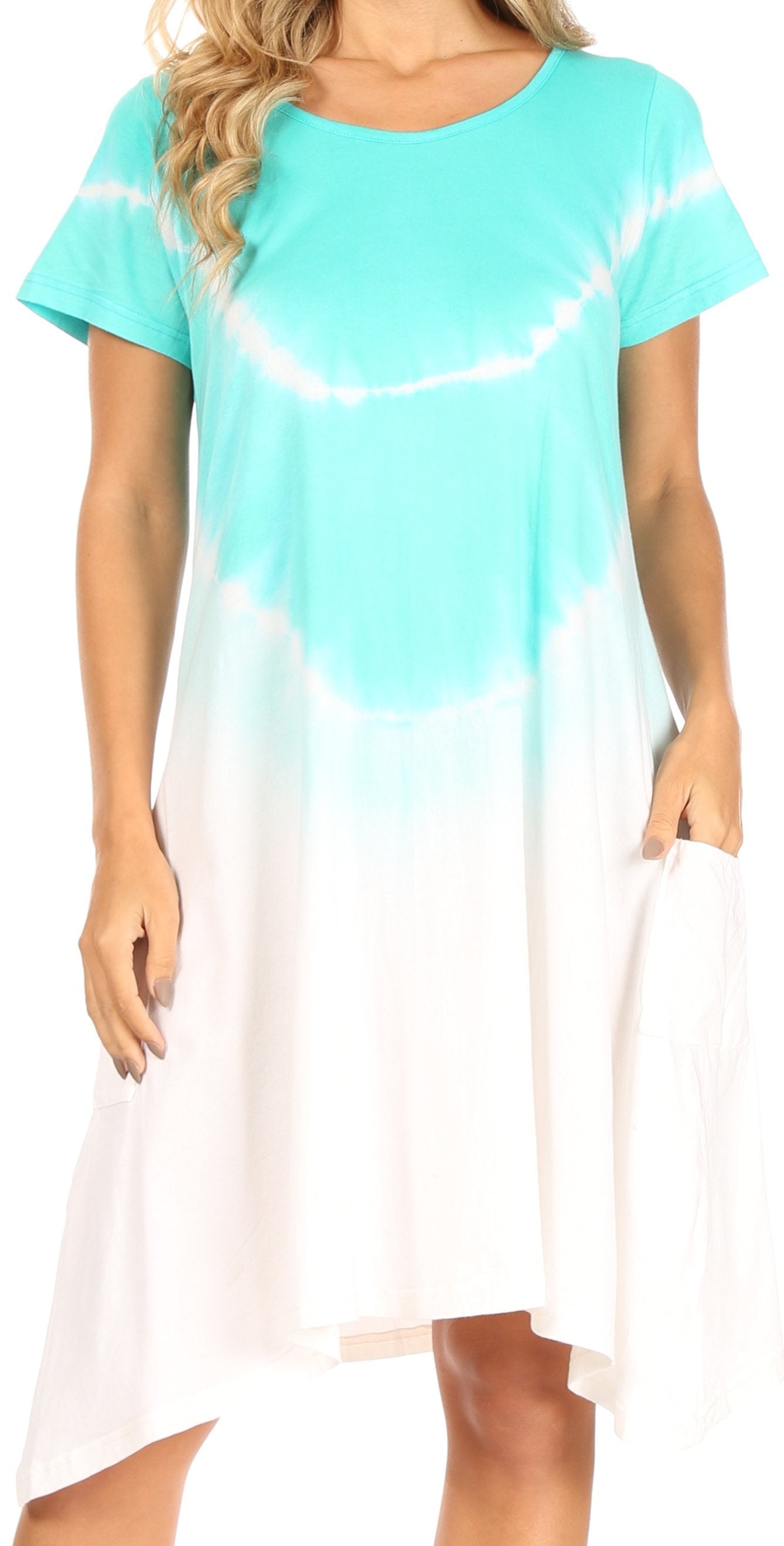 Woman wearing a turquoise and white tie-dye dress.