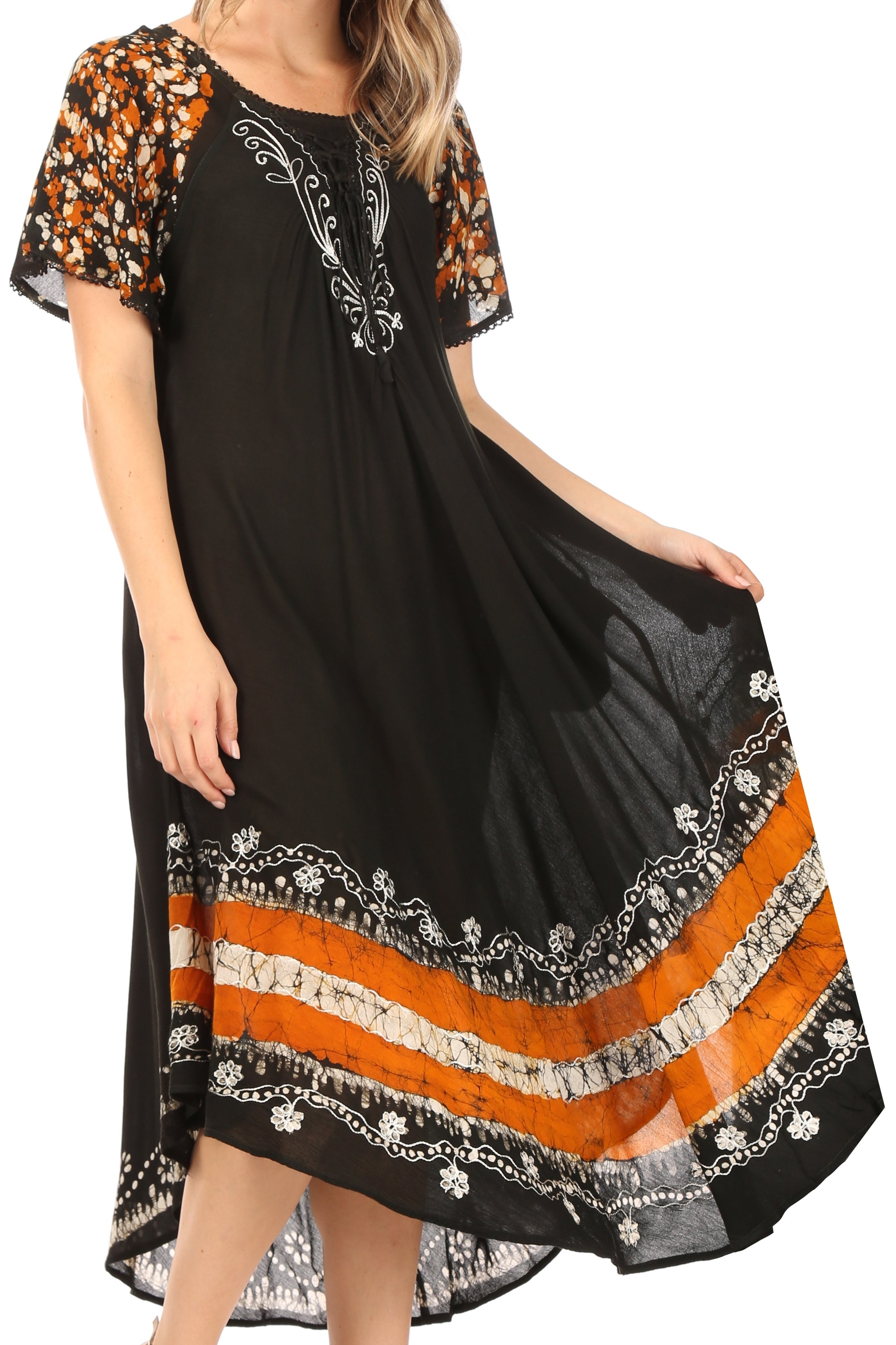 Black dress with orange and white patterns on a white background