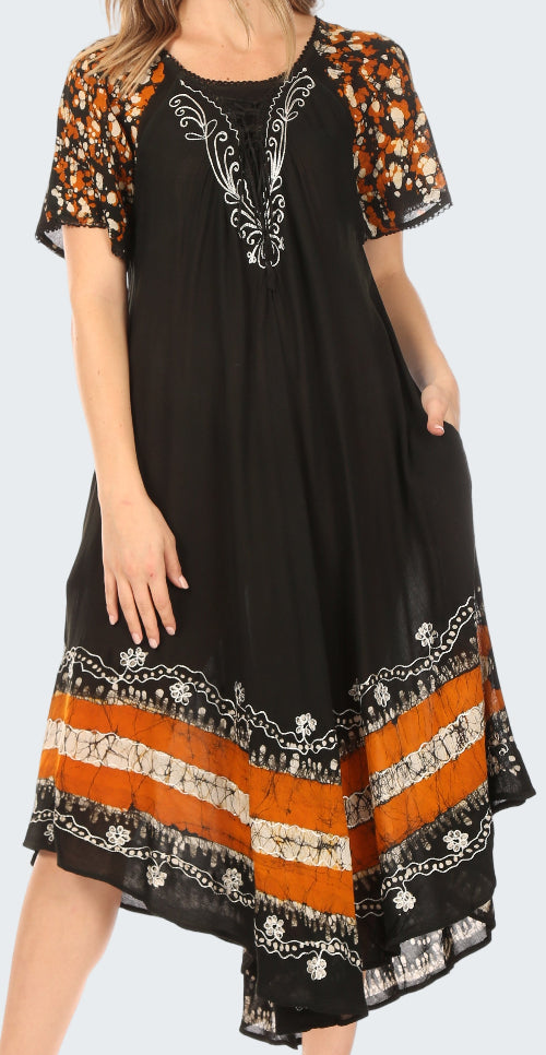 Black dress with orange and white patterns on a white background