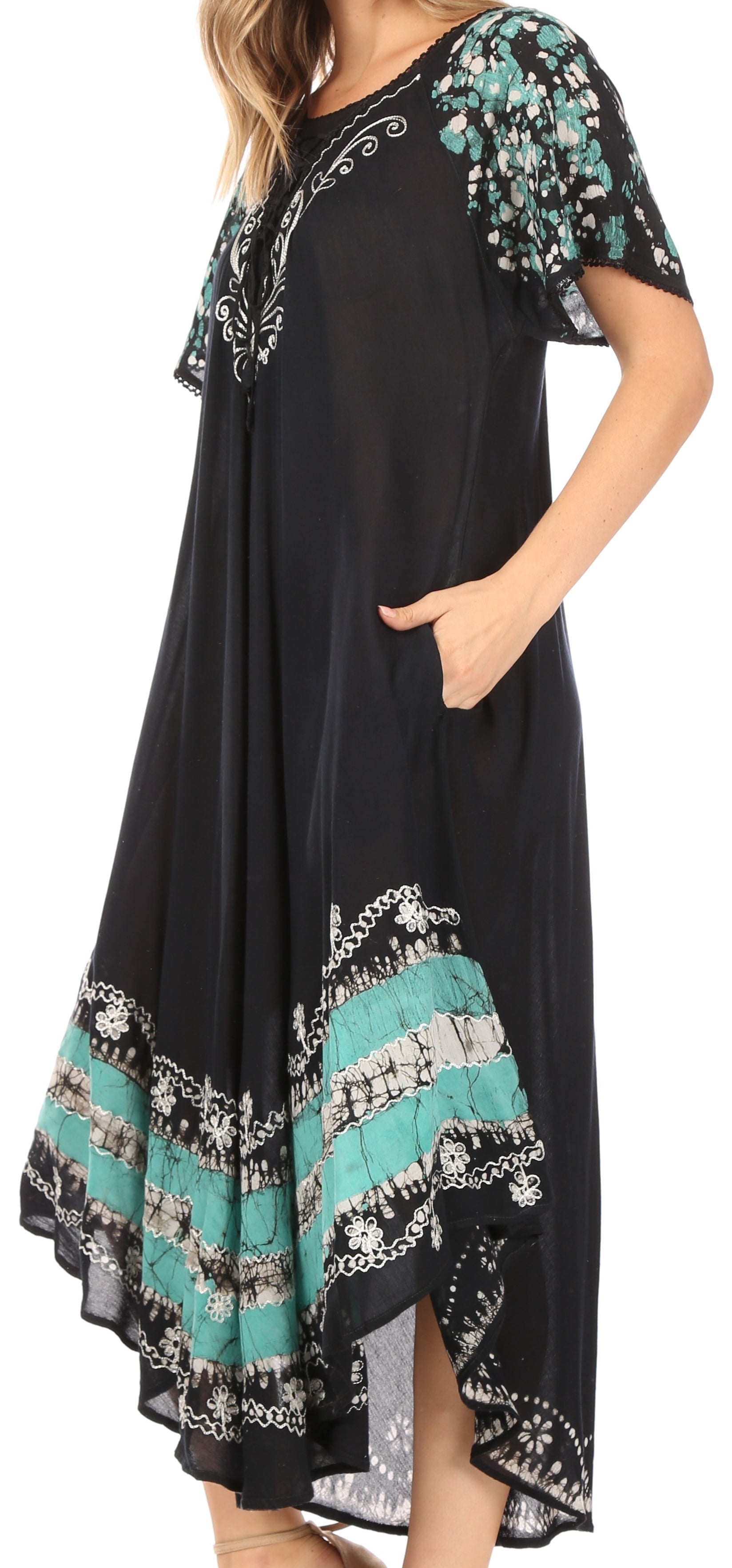 Black dress with floral patterns on a white background