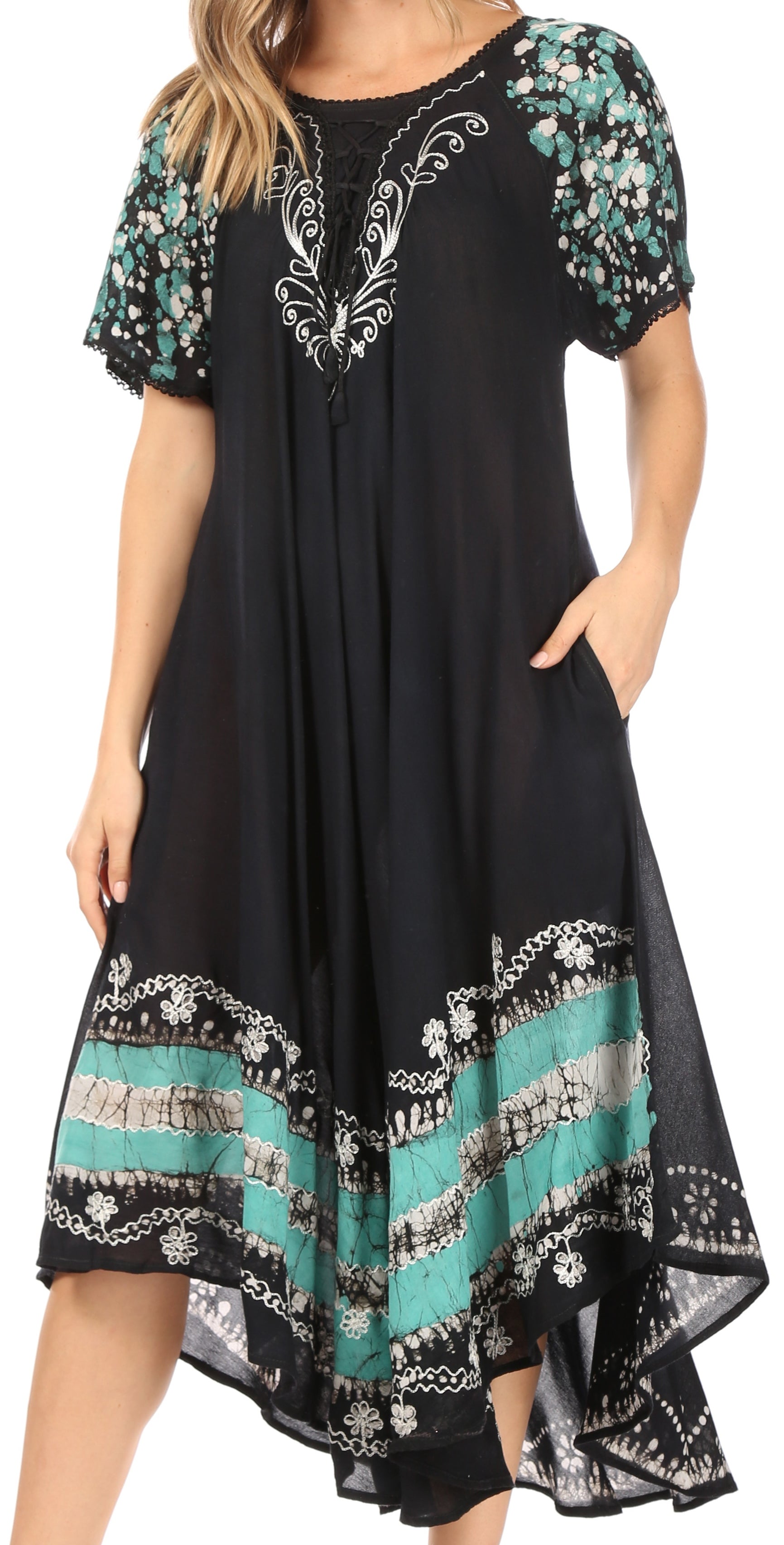 Black dress with floral sleeves and patterns on a white background