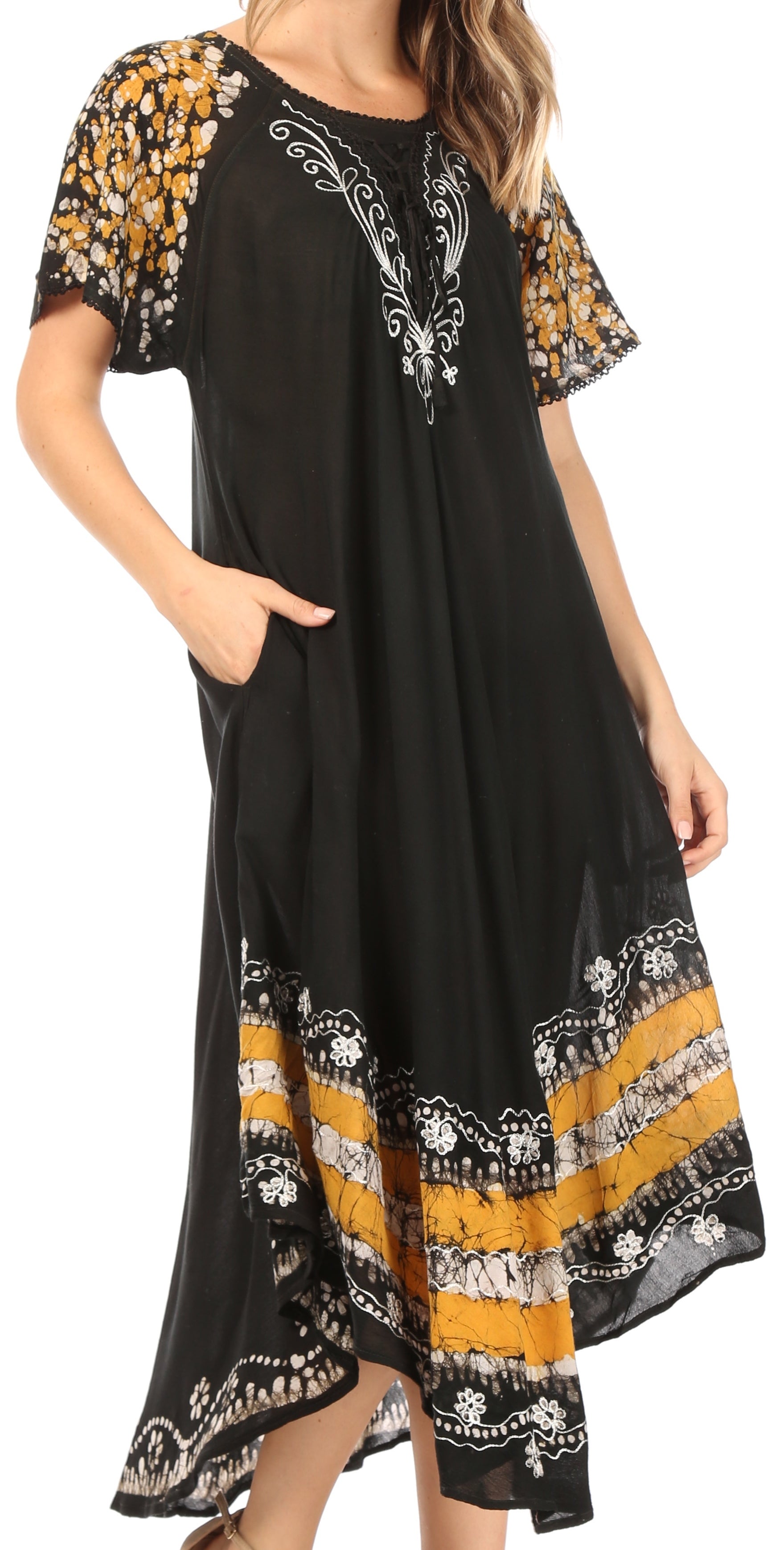 Black dress with floral and stripe patterns on a white background