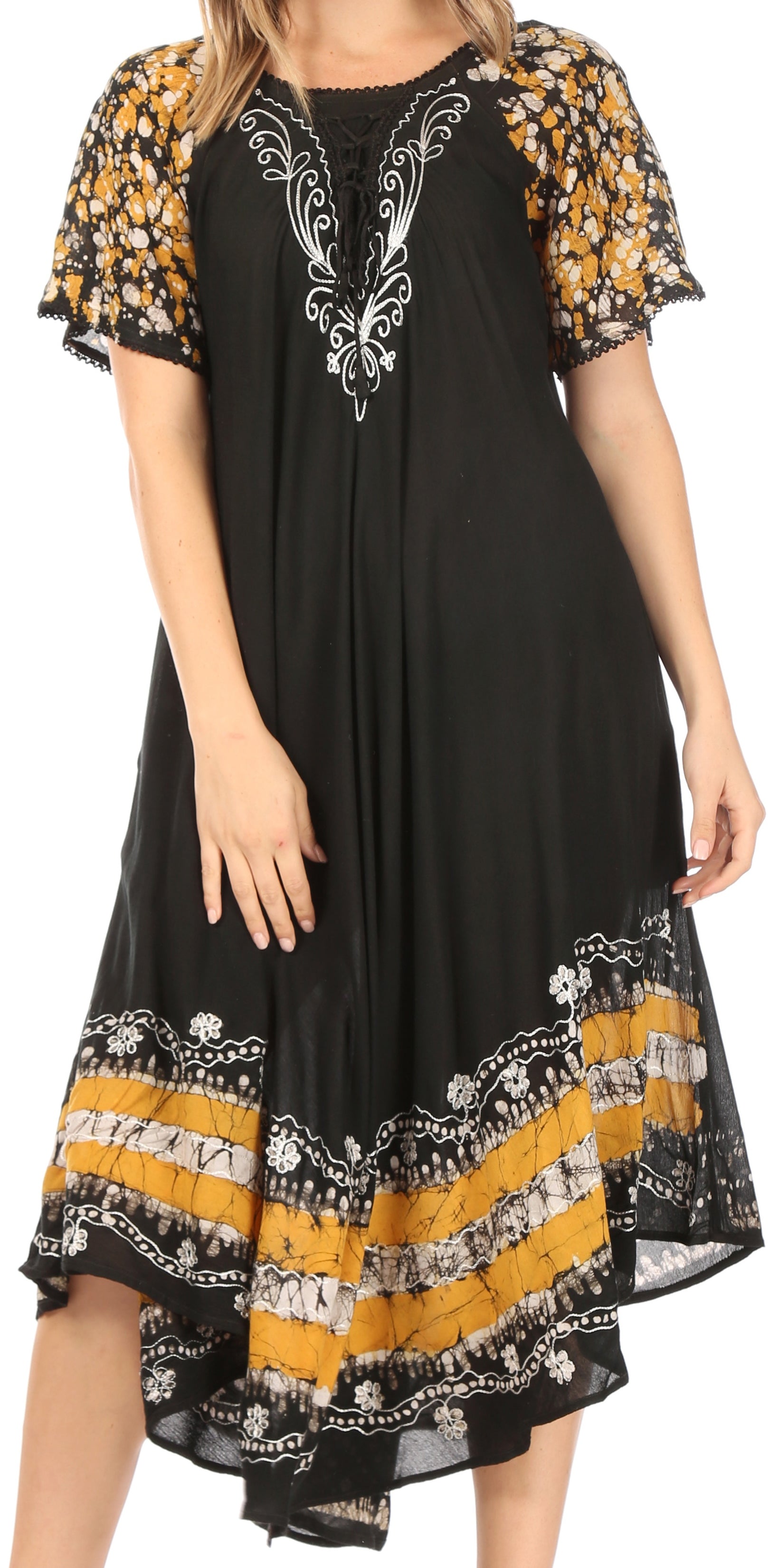 Black dress with yellow and white floral patterns on a white background