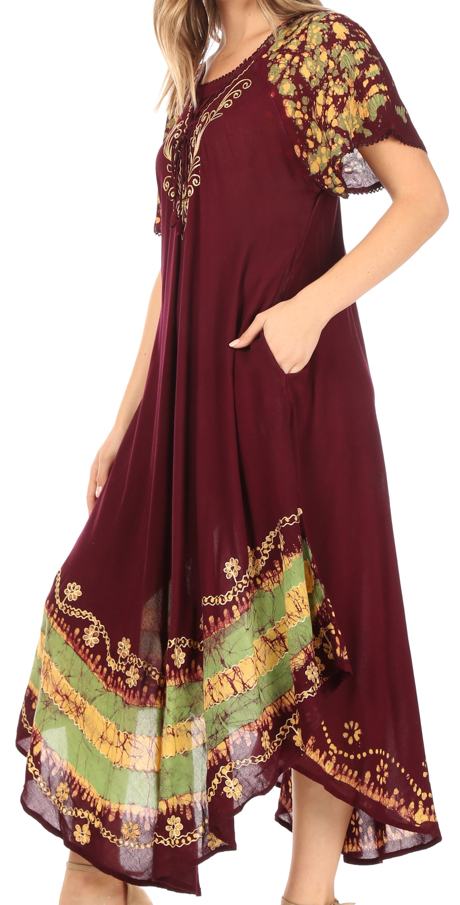 Maroon dress with colorful embroidery on a white background