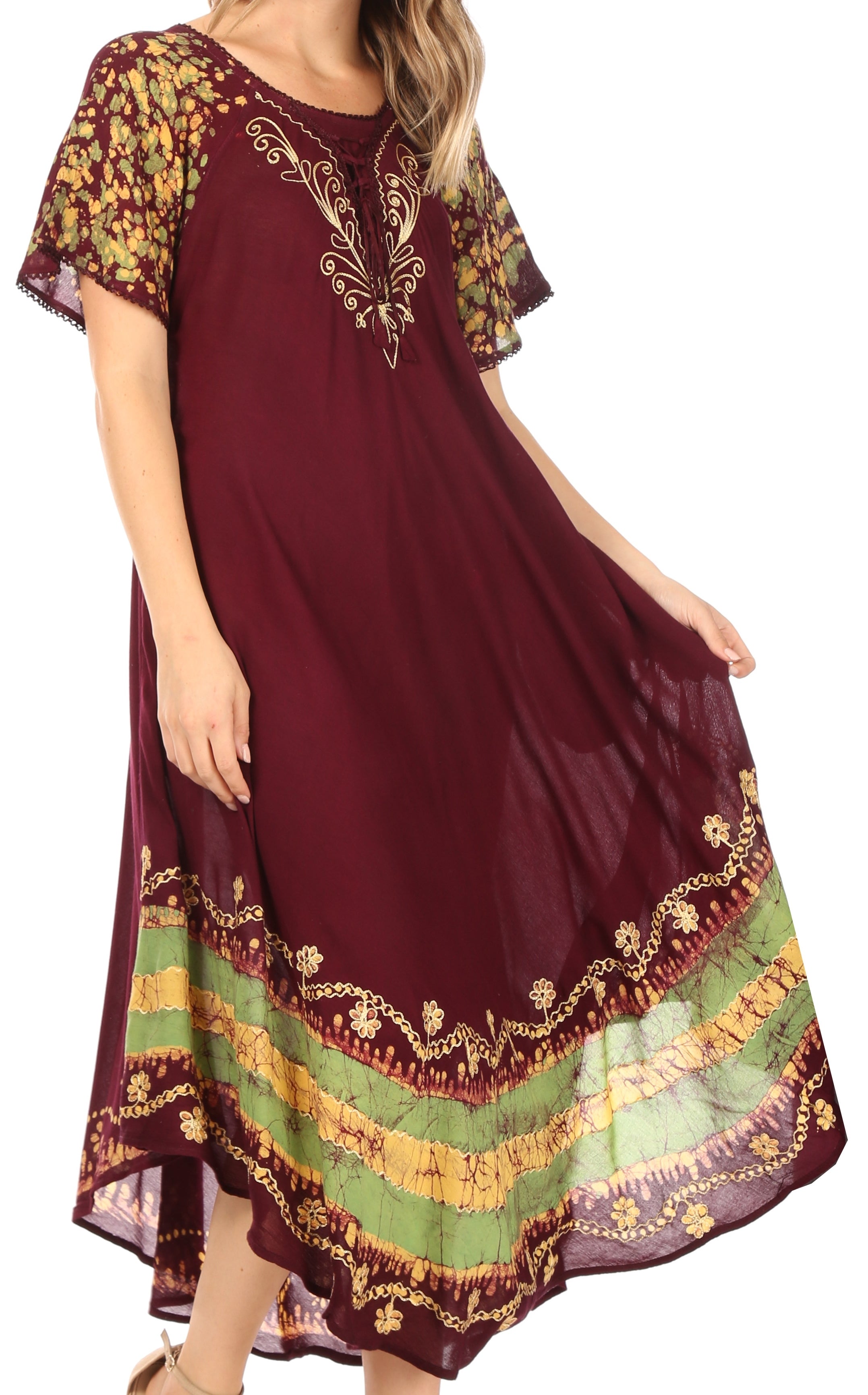 Maroon dress with gold and green embroidery on a white background