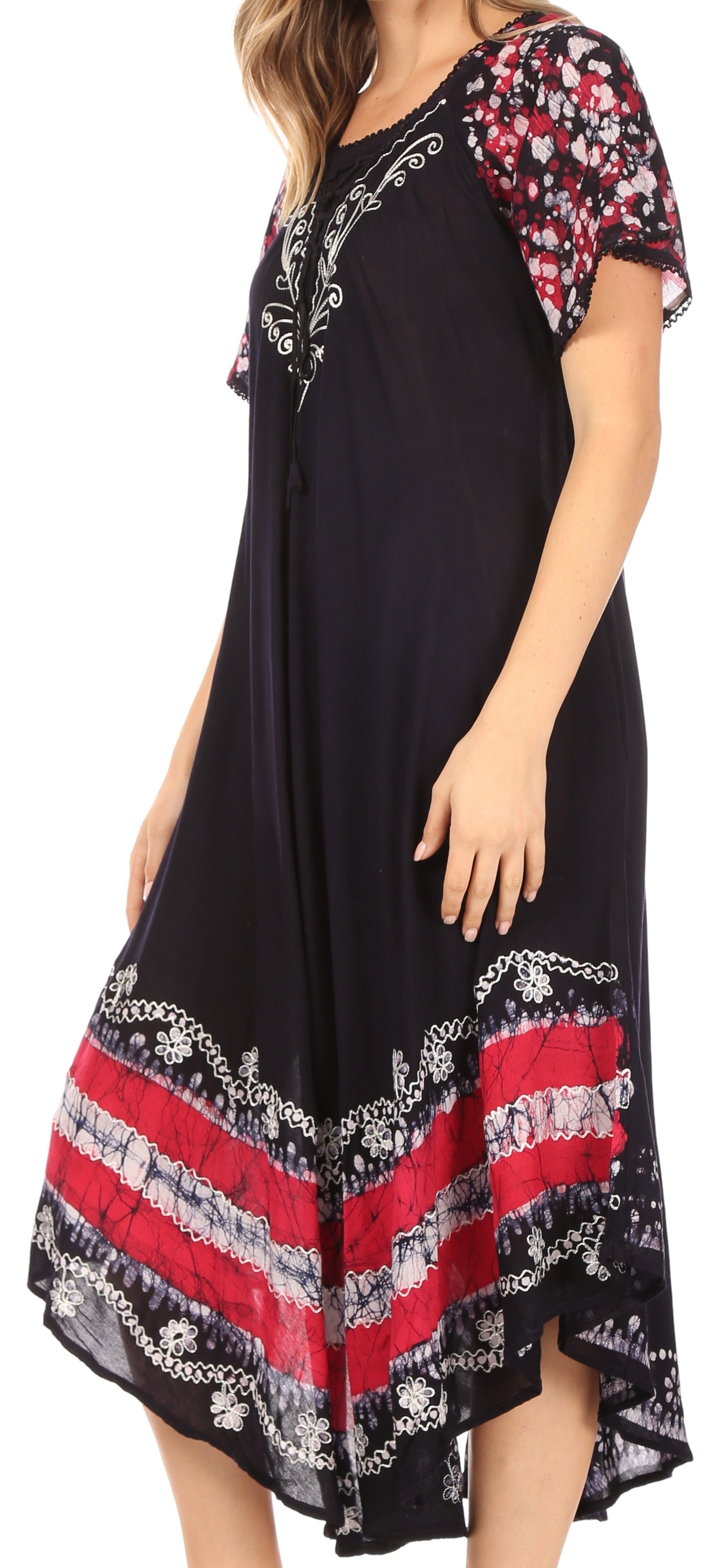 Black dress with colorful floral and striped patterns on a white background