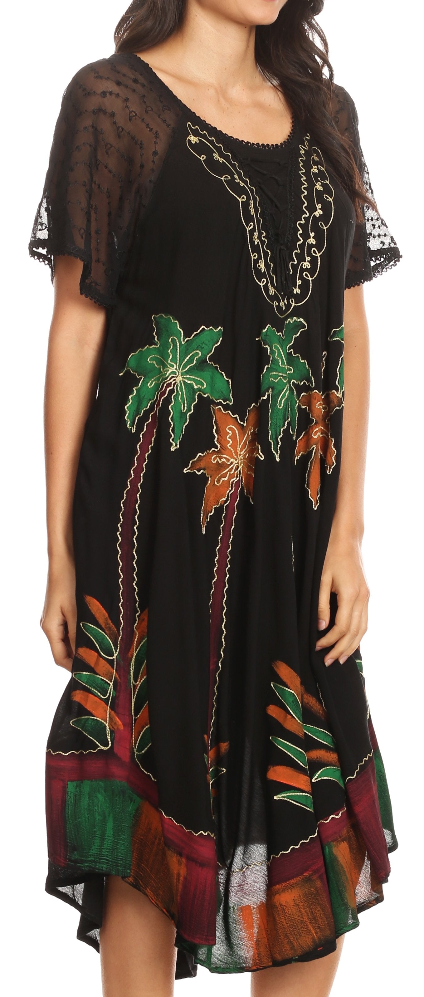 Black dress with colorful palm tree designs on a model