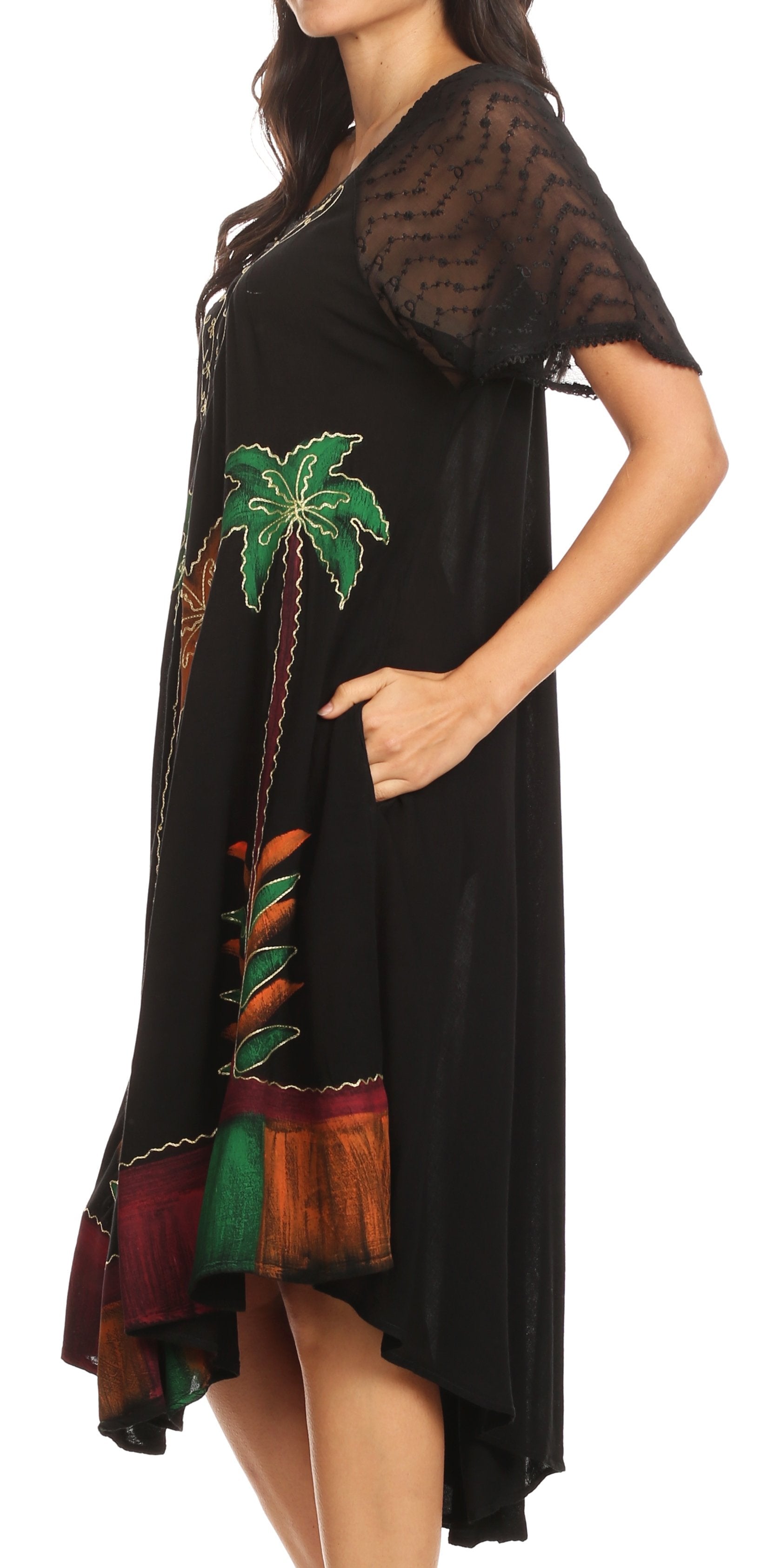 Black dress with colorful palm tree design on a white background