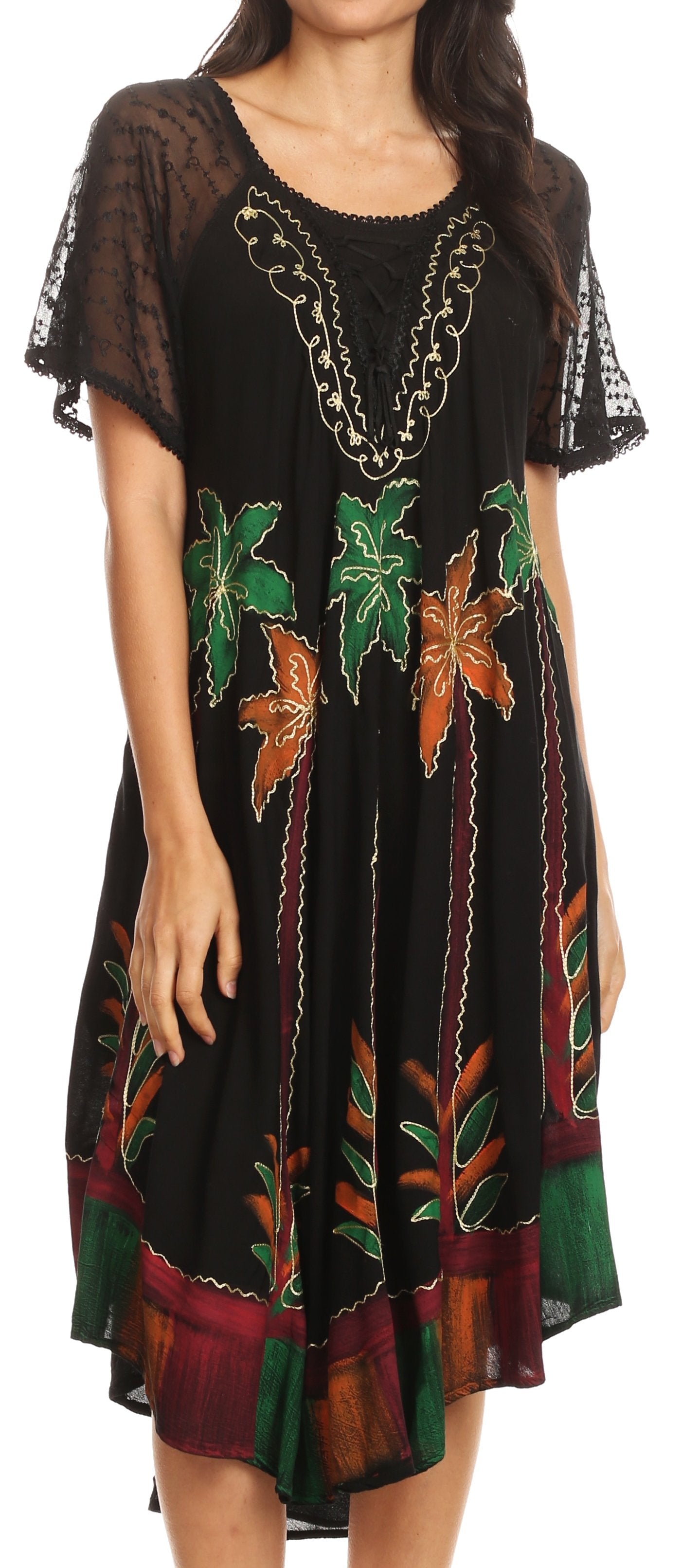 Black dress with colorful leaf patterns worn by a model