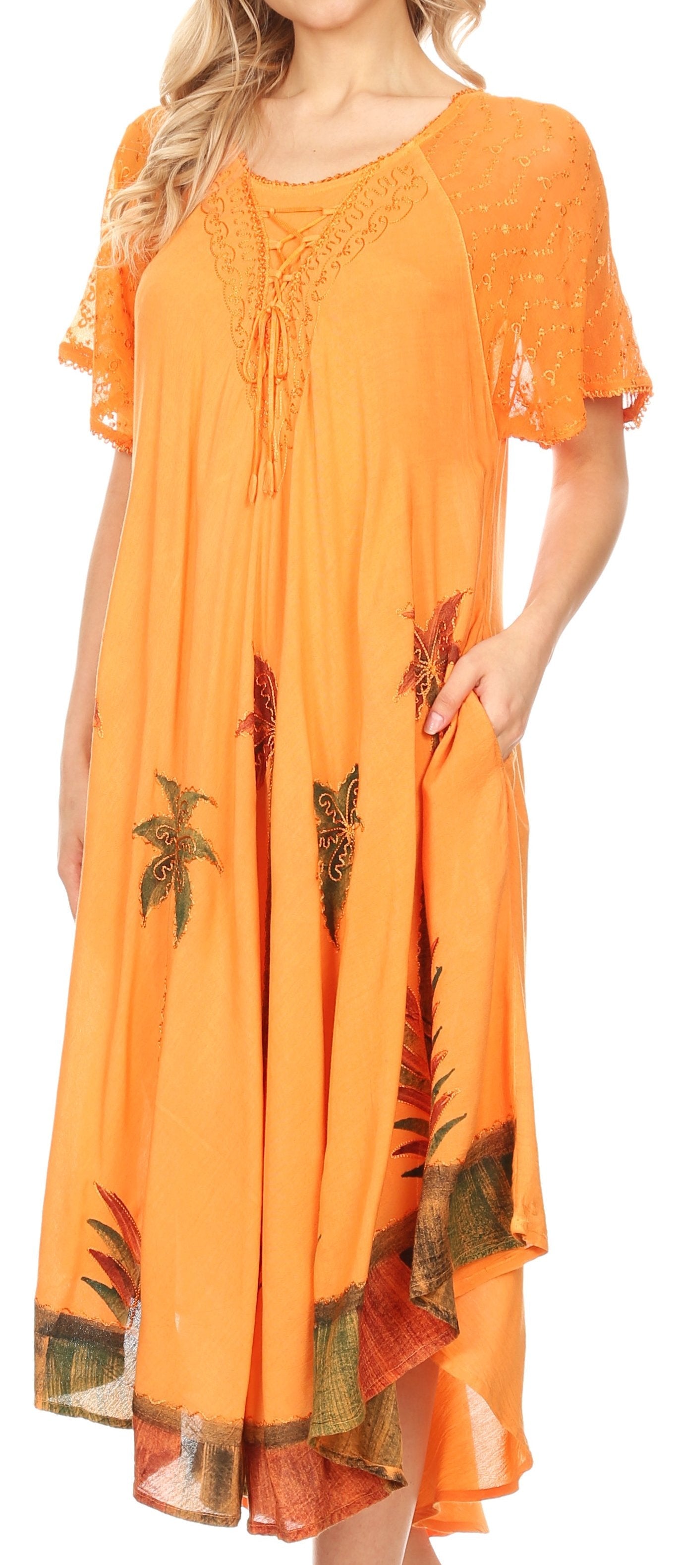 Orange dress with floral patterns on a plain background