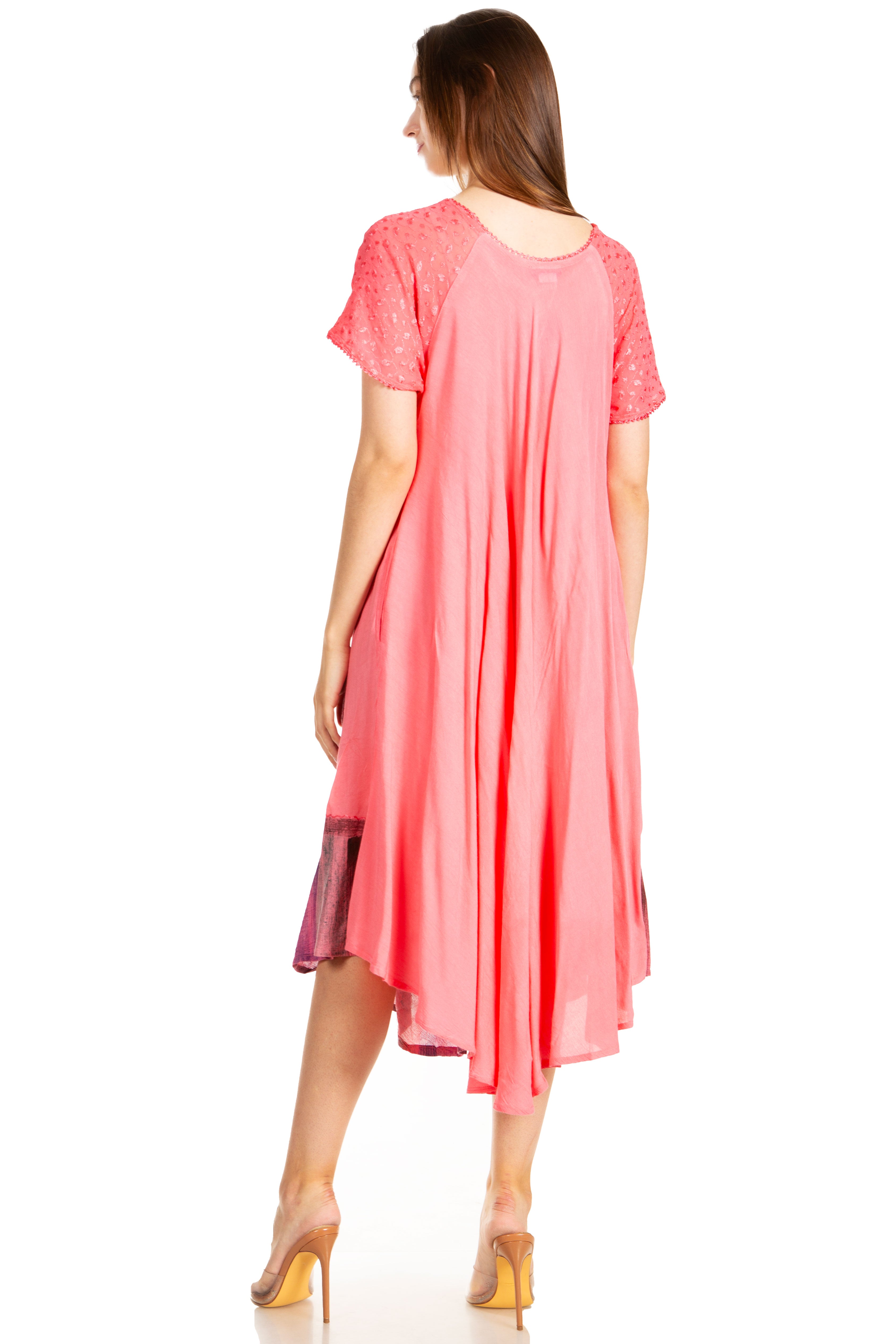 Woman wearing a pink dress on a white background