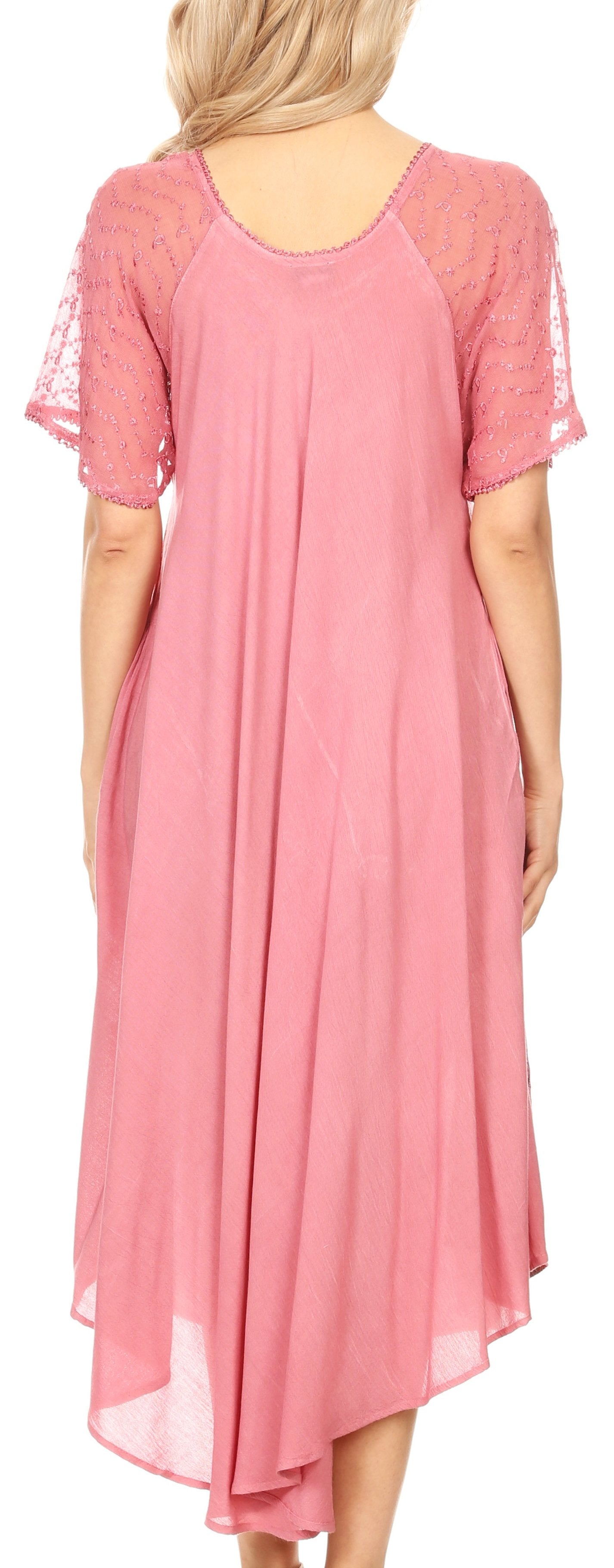 Pink dress with lace sleeves worn by a person
