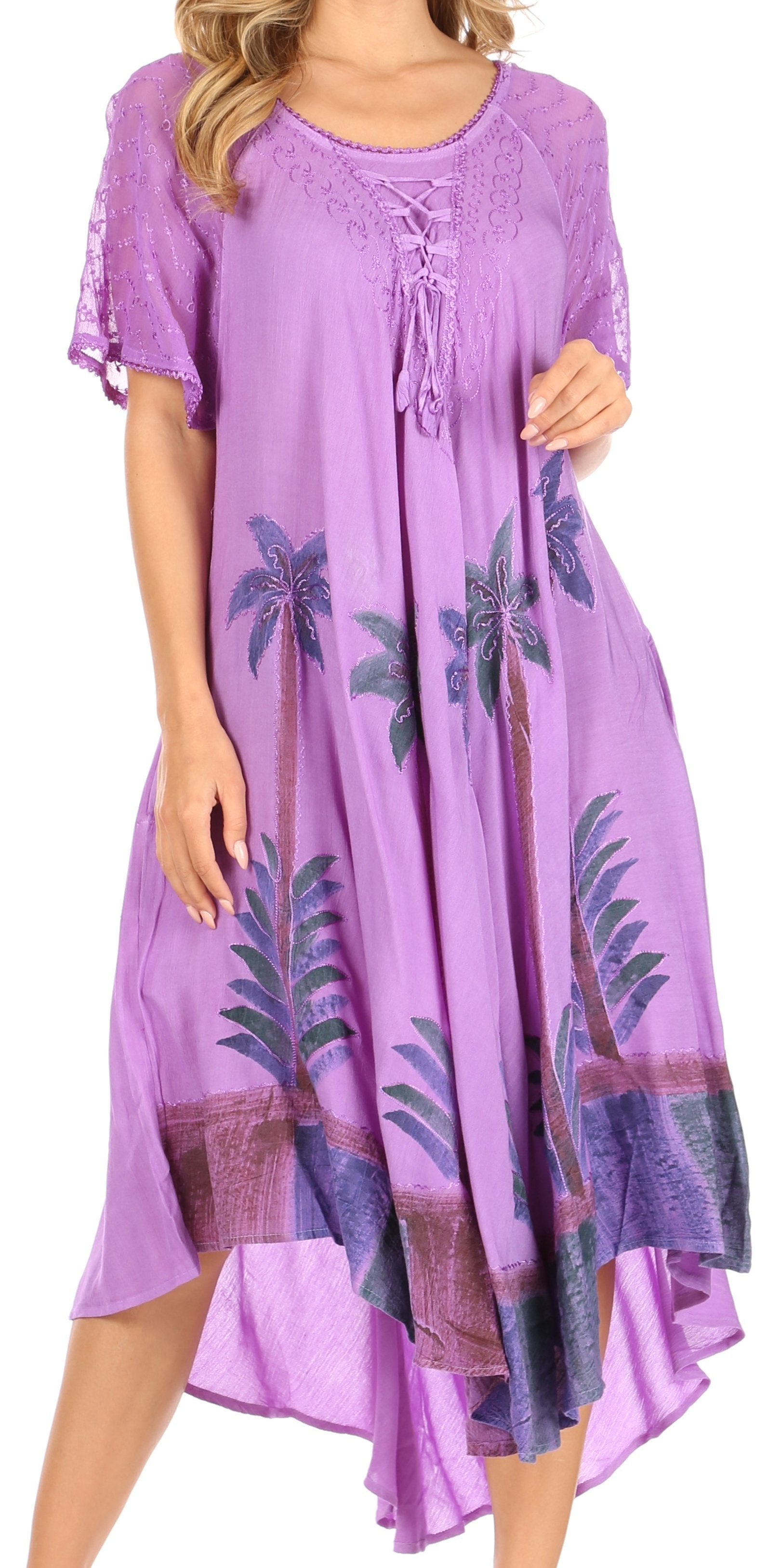 Woman wearing a purple dress with palm tree patterns on a white background