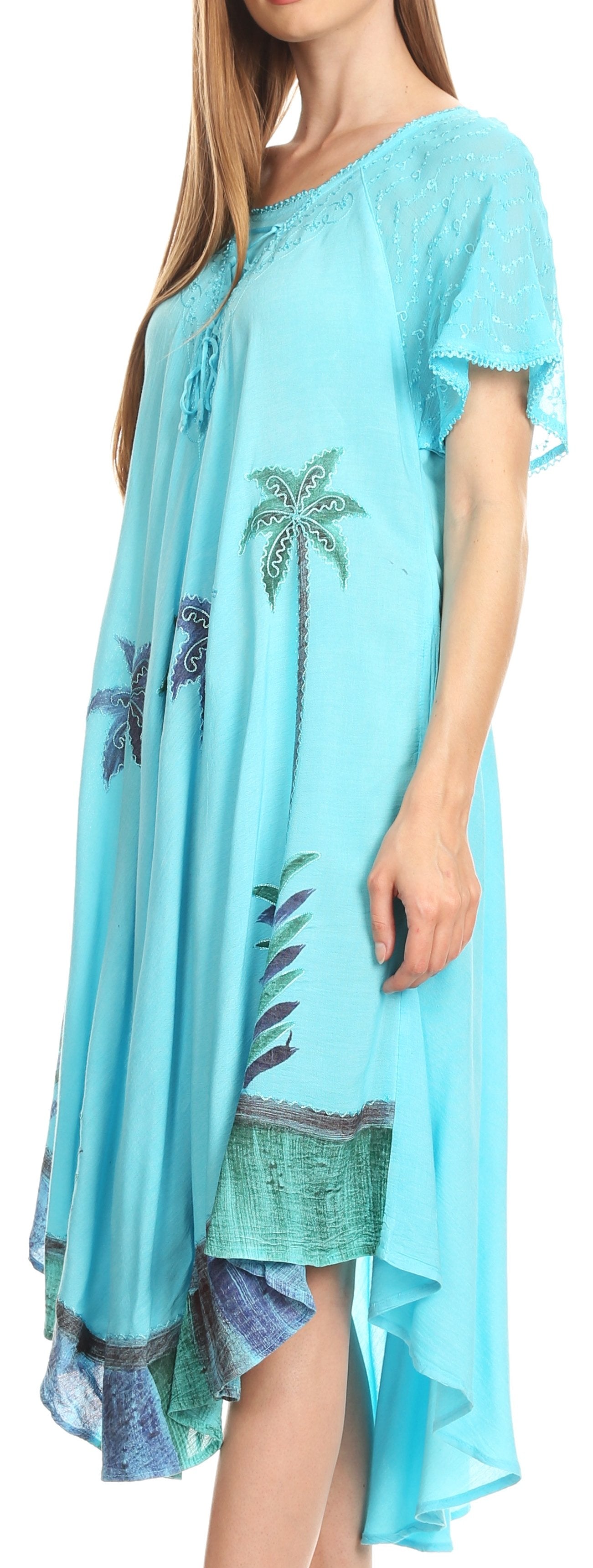 Light blue dress with palm tree designs on a white background