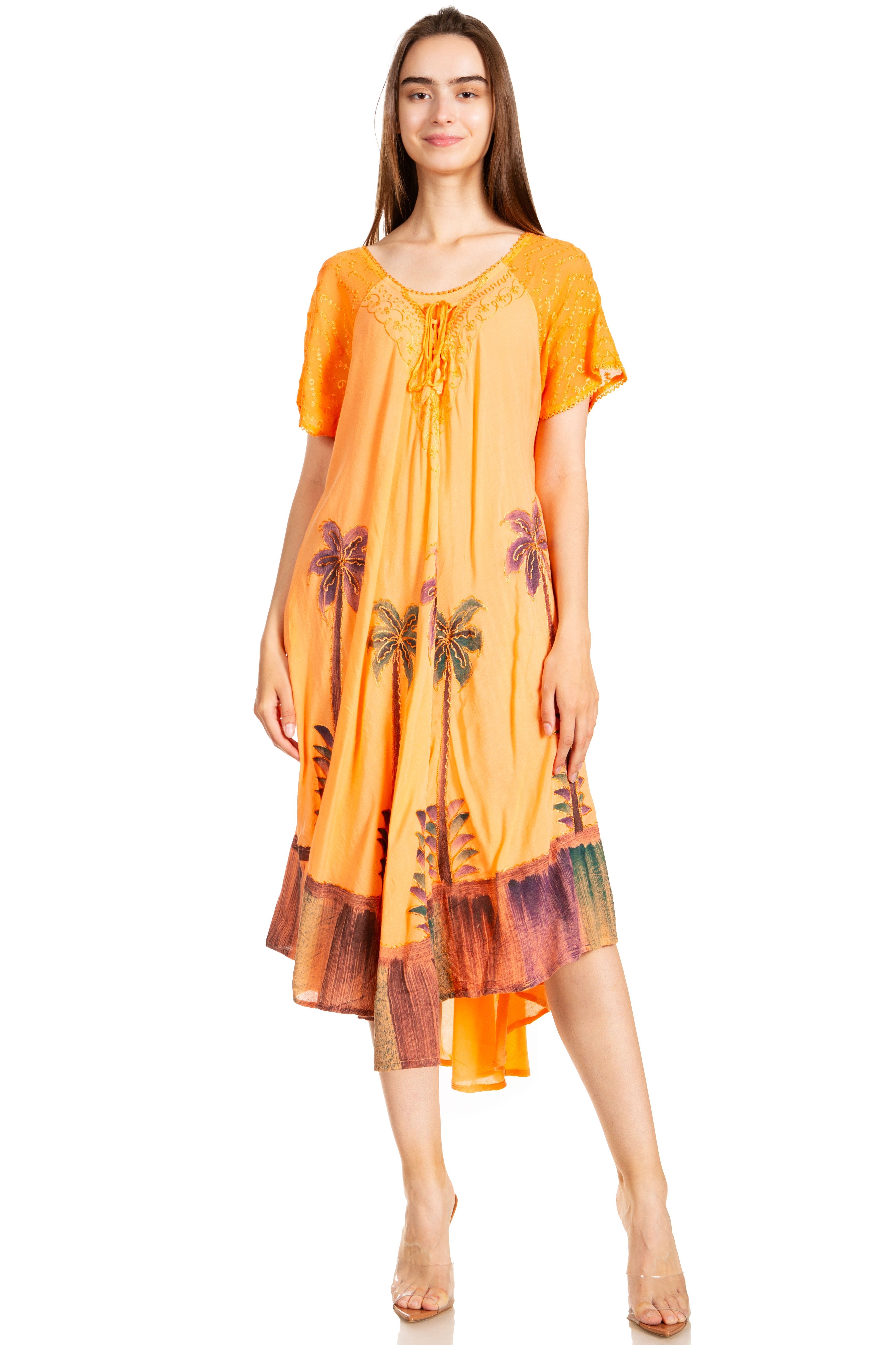 Woman wearing an orange dress with palm tree patterns on a white background