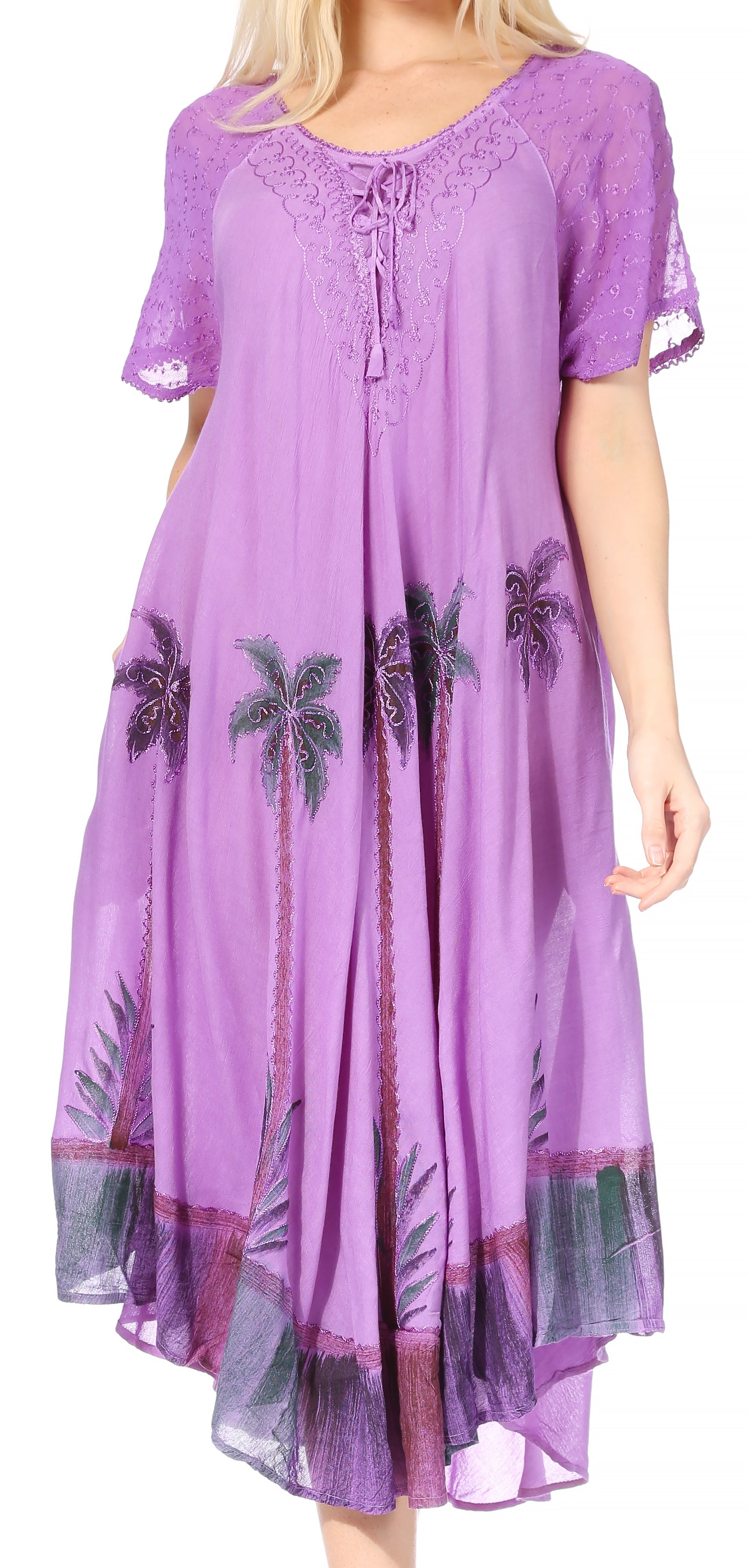 Purple dress with palm tree patterns on a white background
