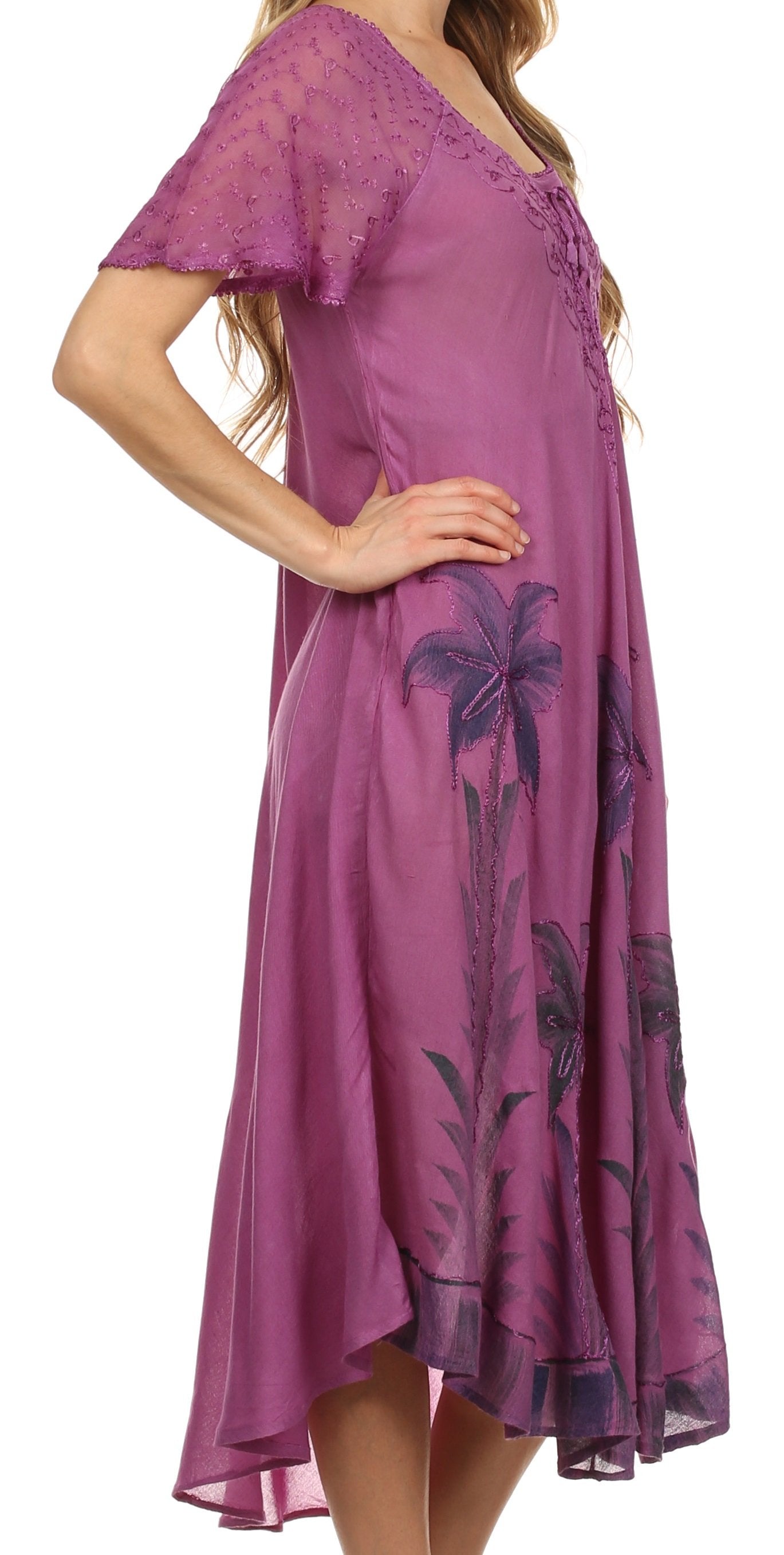 Purple dress with palm tree design on a white background