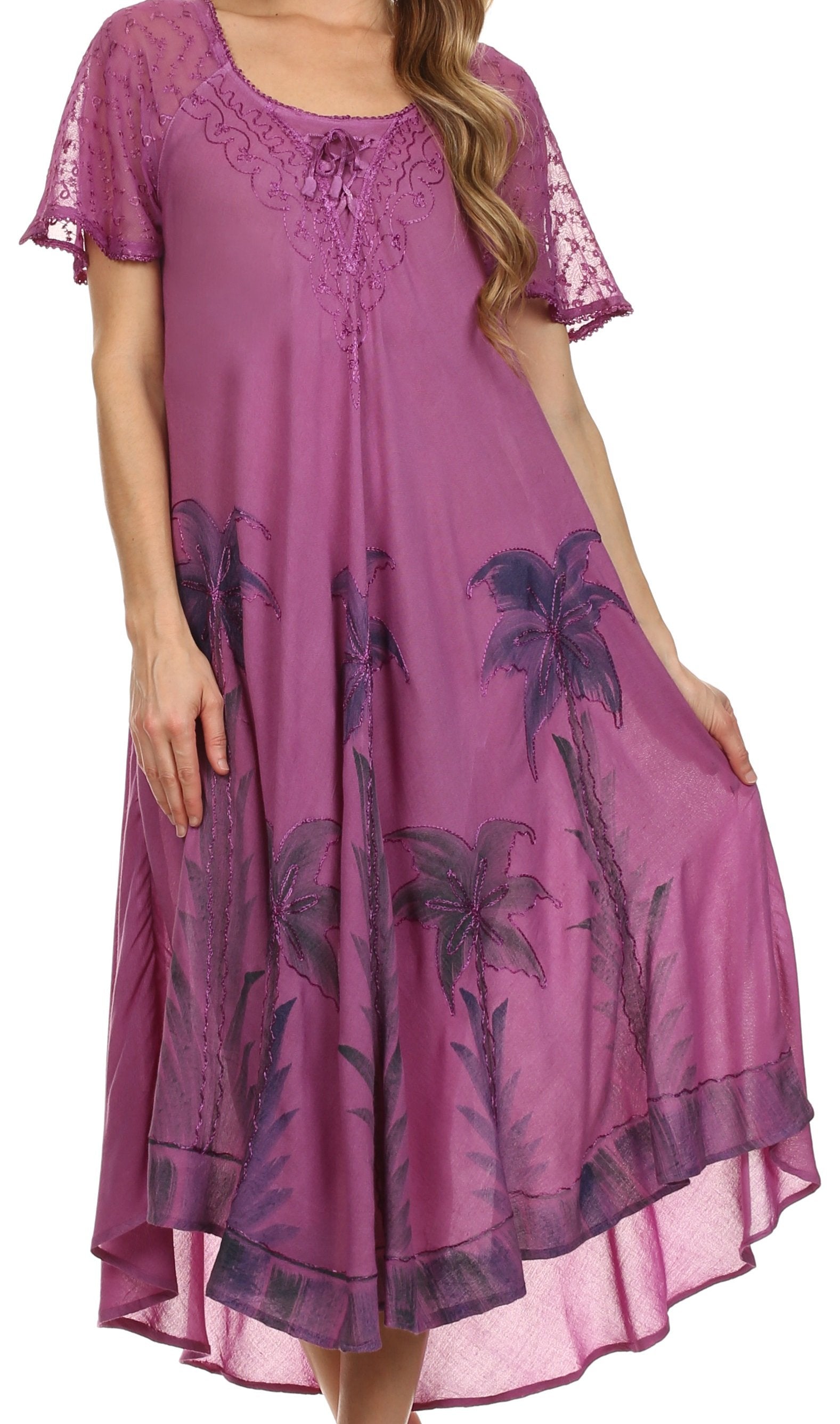 Purple dress with palm tree pattern on a white background