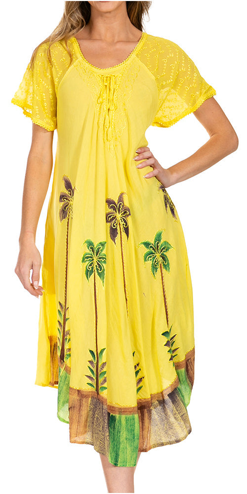 Yellow dress with palm tree patterns on a white background
