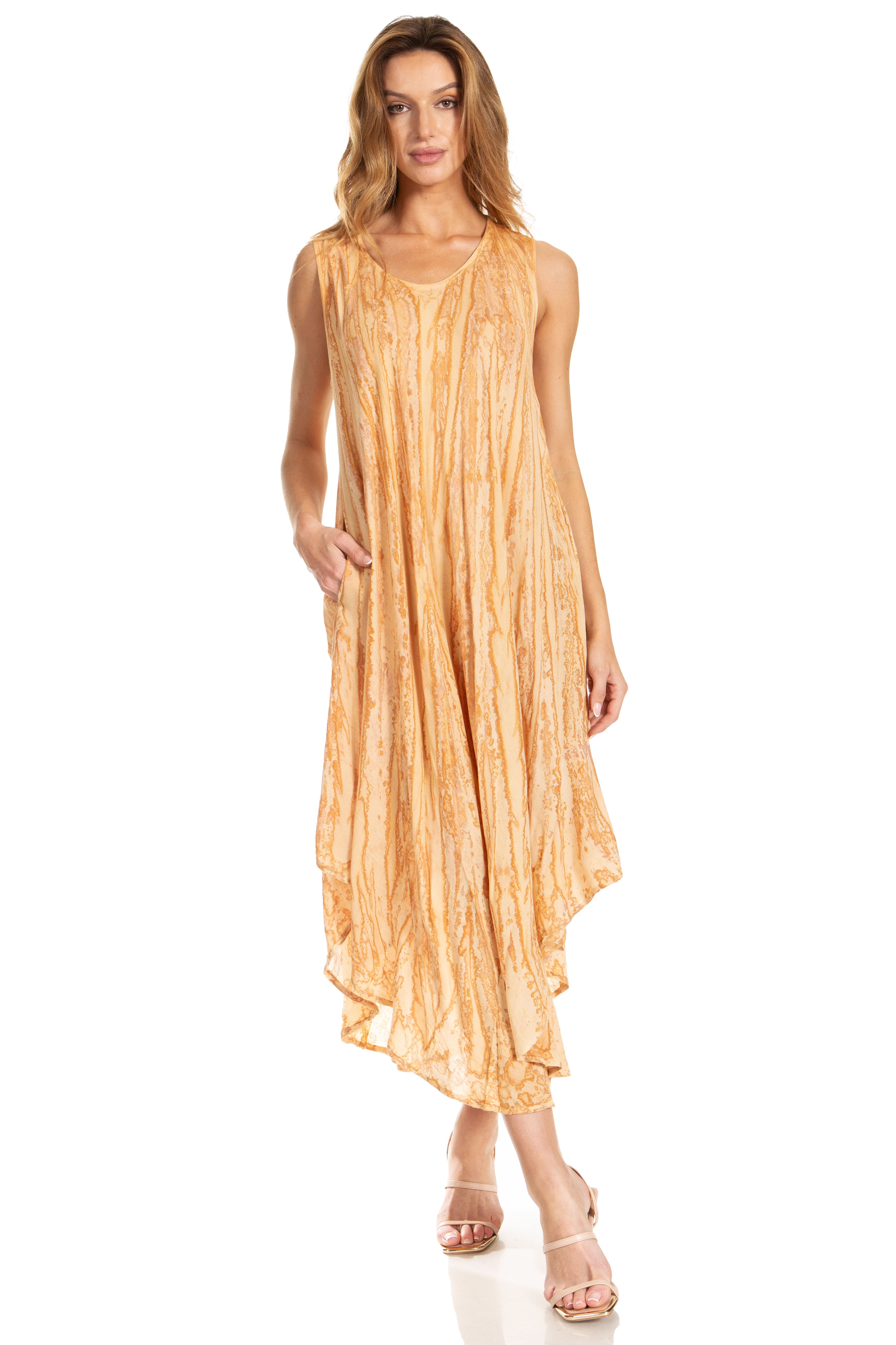 Woman wearing a long, light orange dress on a white background