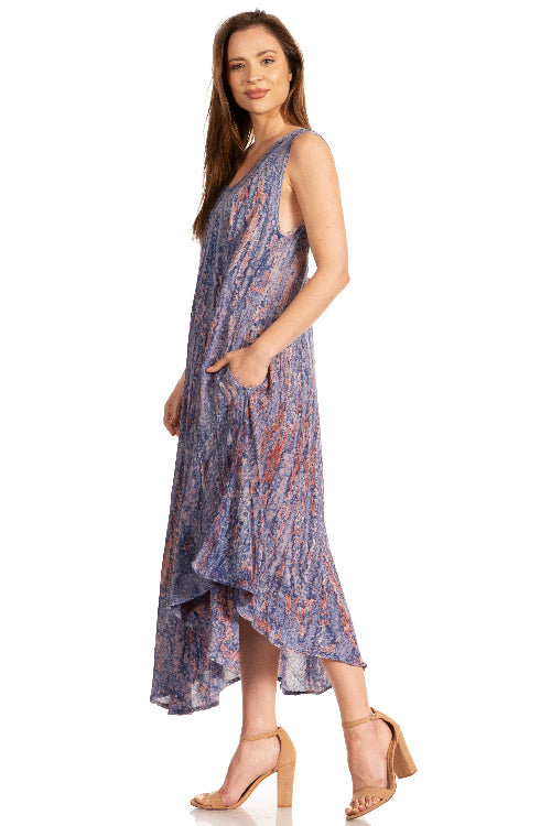 Woman wearing a patterned dress on a white background