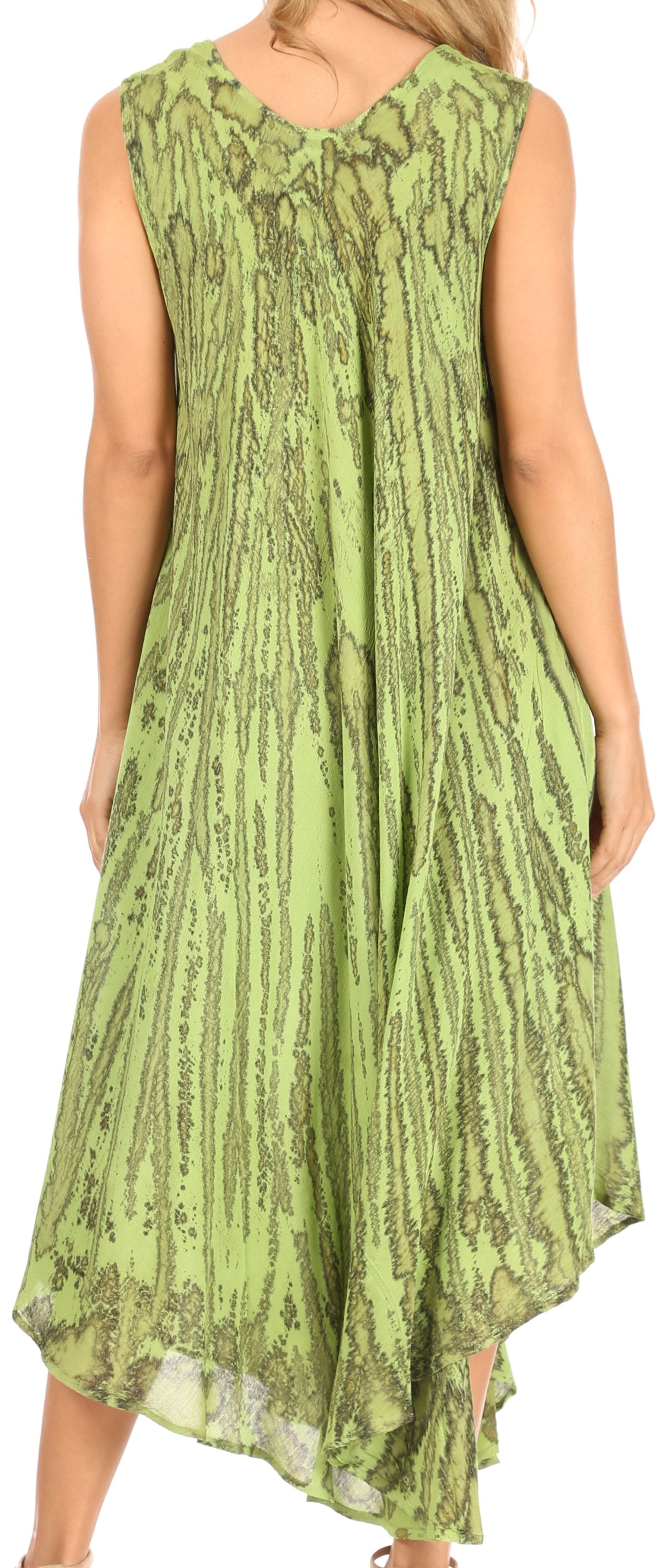 Woman wearing a green patterned dress against a white background