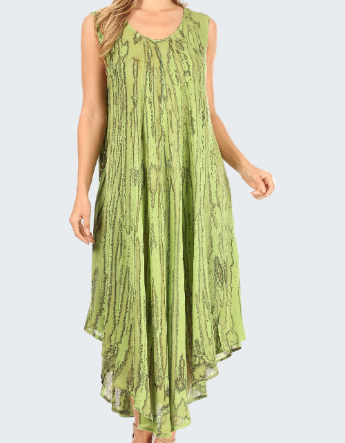 Green patterned dress worn by a model on a white background