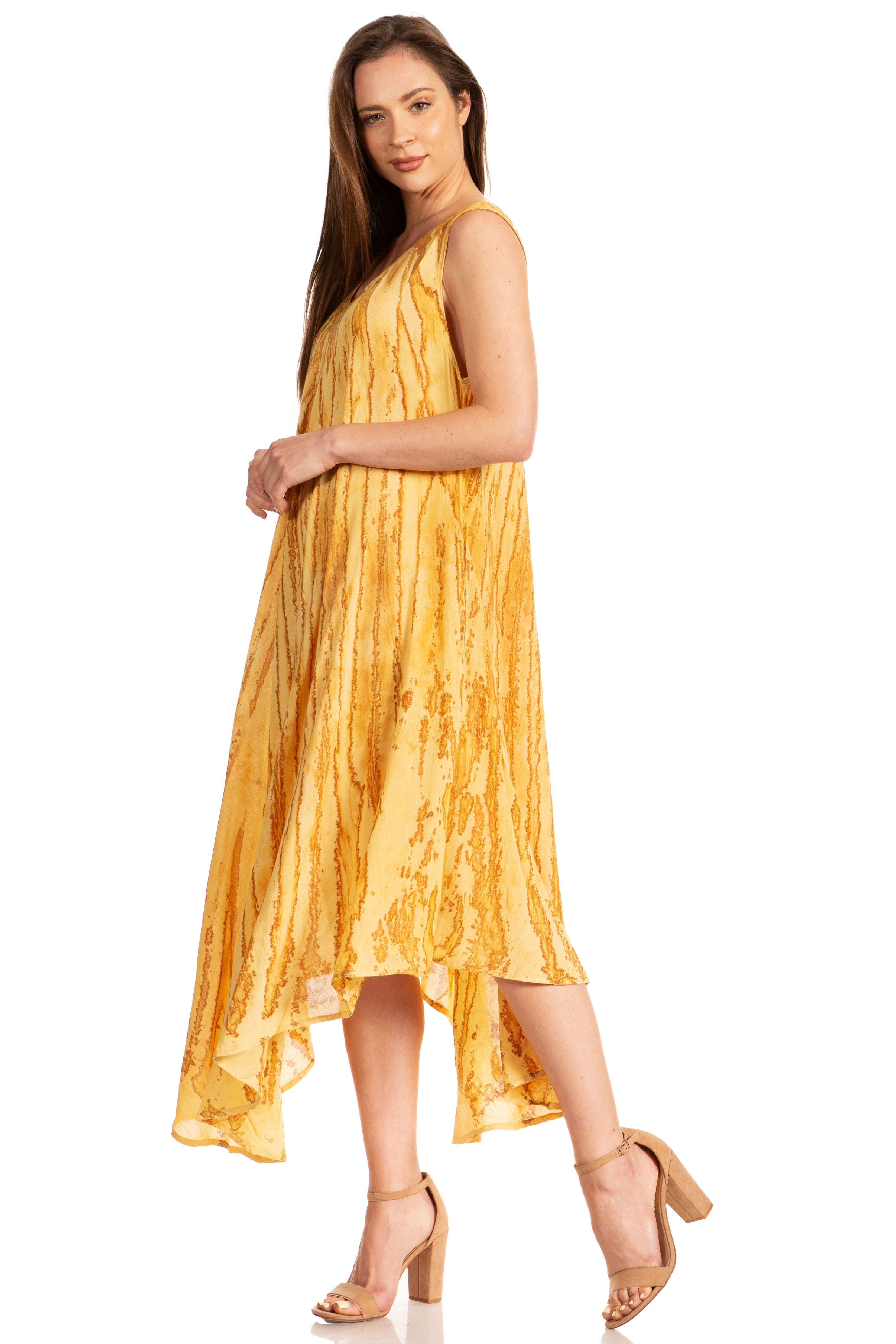 Woman wearing a yellow dress on a white background