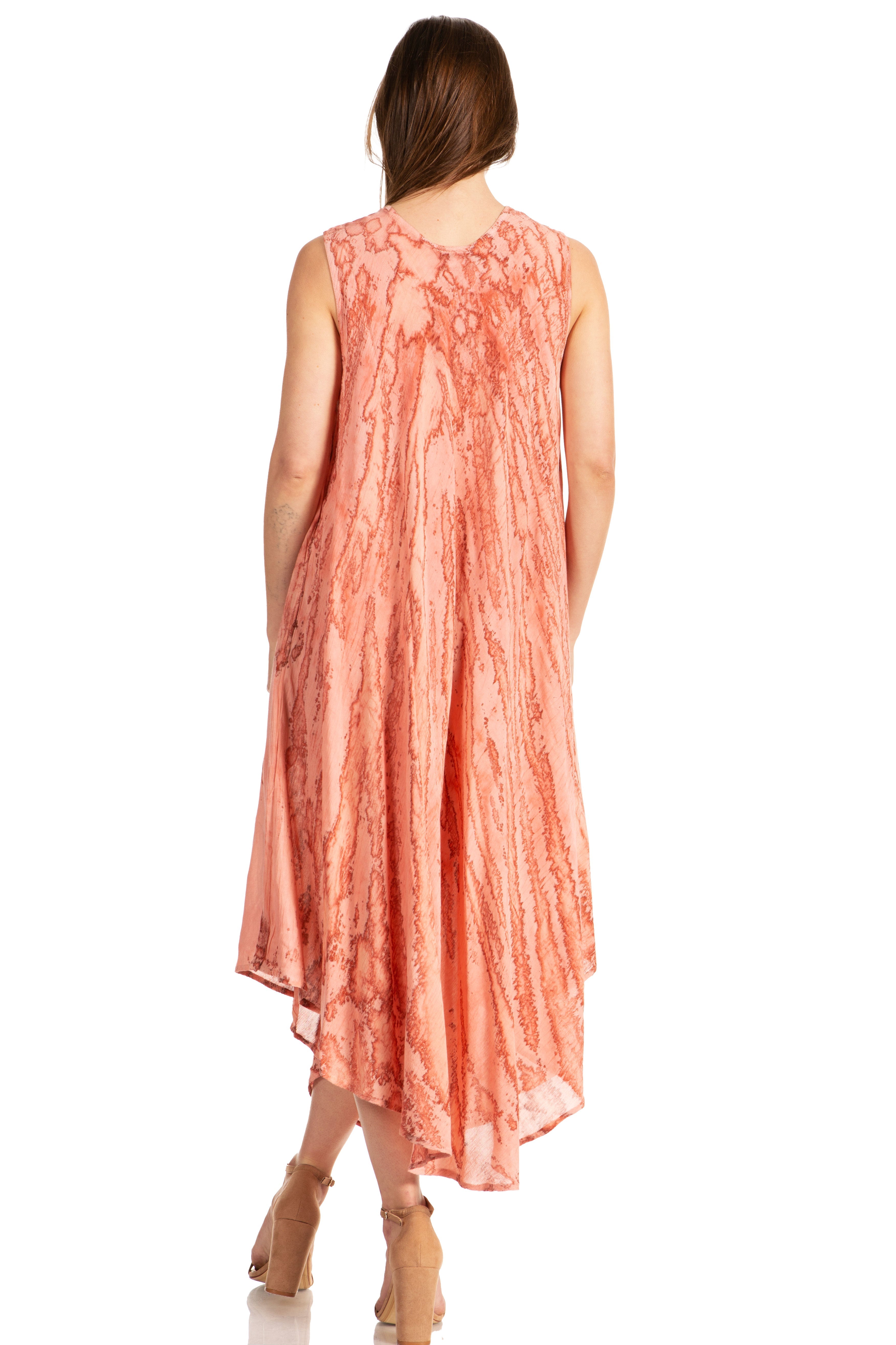 Woman wearing a coral dress on a white background