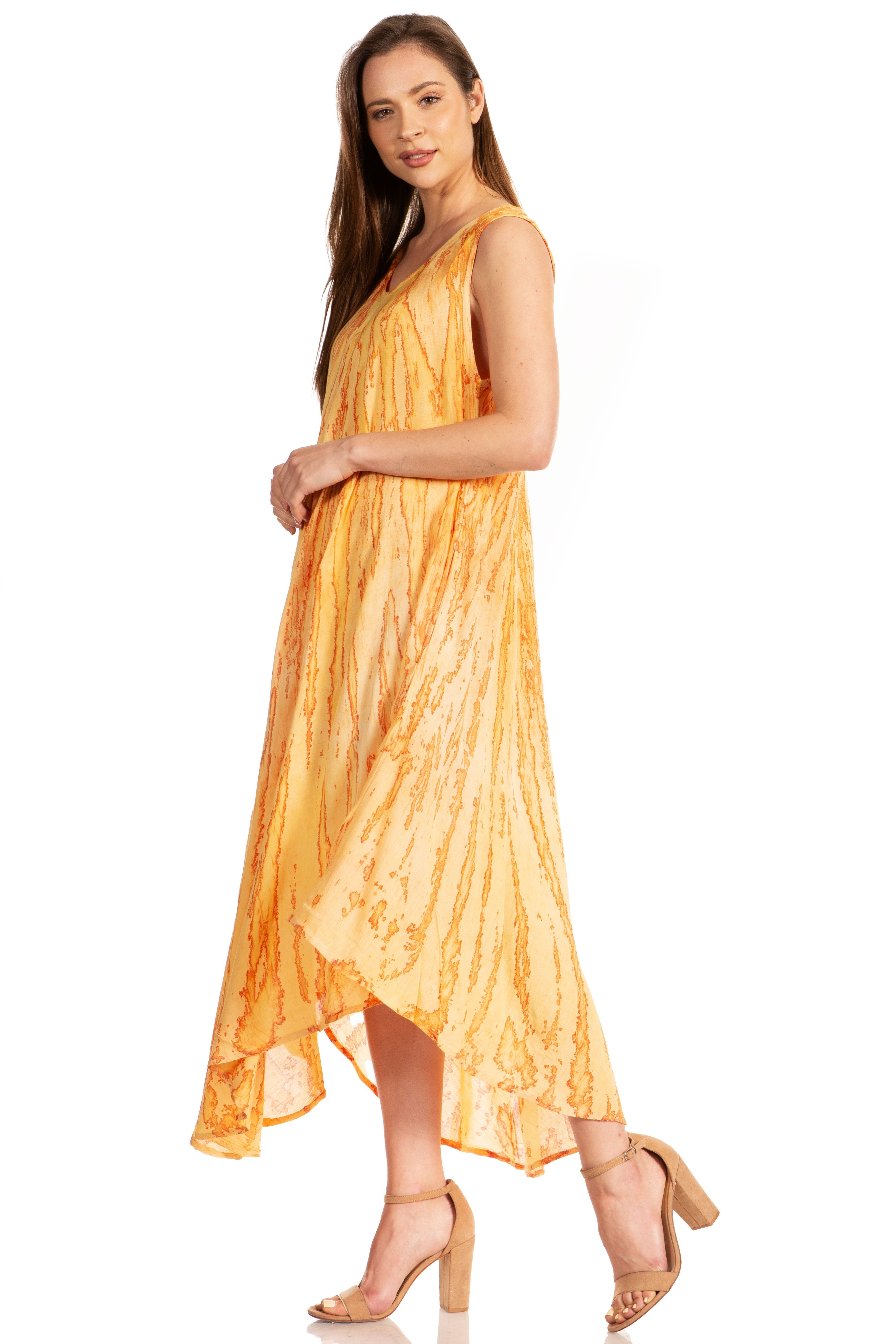 Woman wearing a yellow dress on a white background