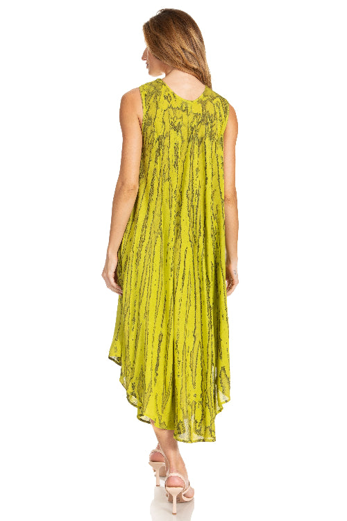 Woman wearing a sleeveless yellow dress with a subtle pattern on a white background