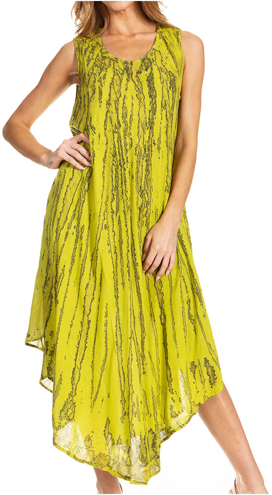 Woman wearing a yellow sleeveless dress with a pattern on a white background