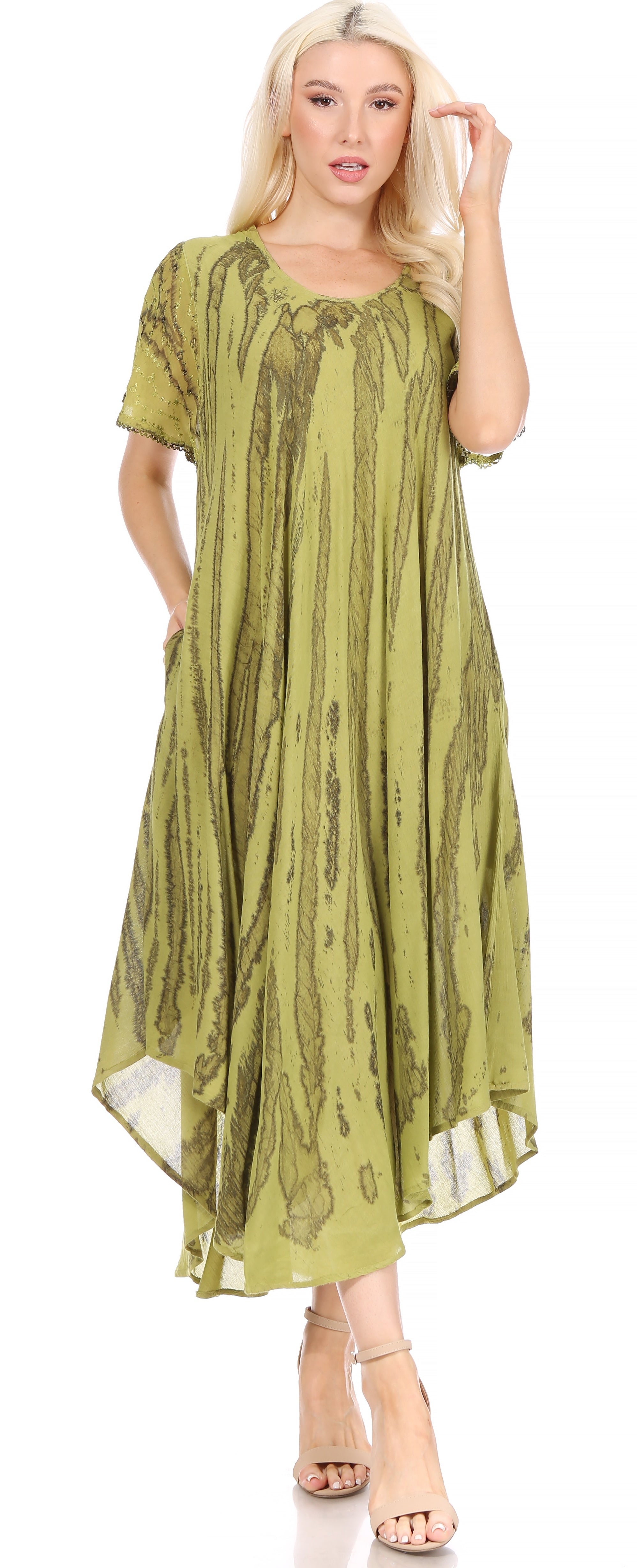 Woman wearing a green dress with a white background