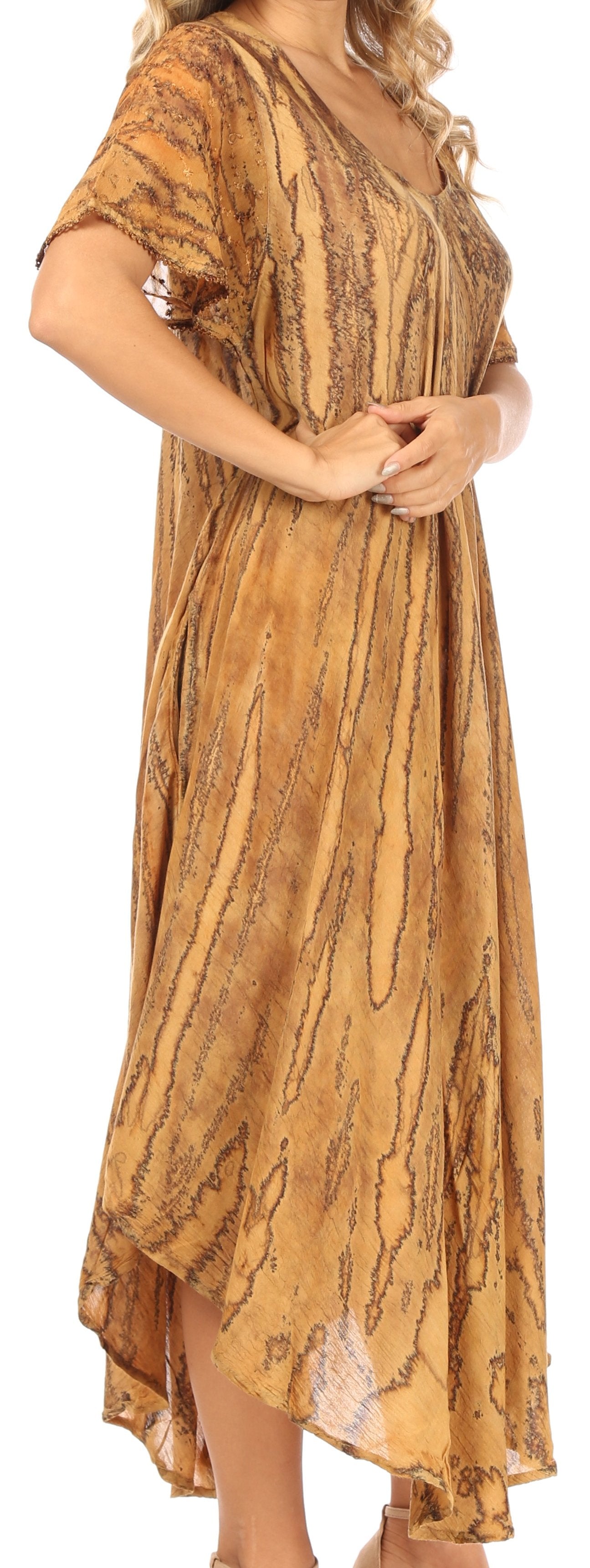 Woman wearing a patterned dress on a white background