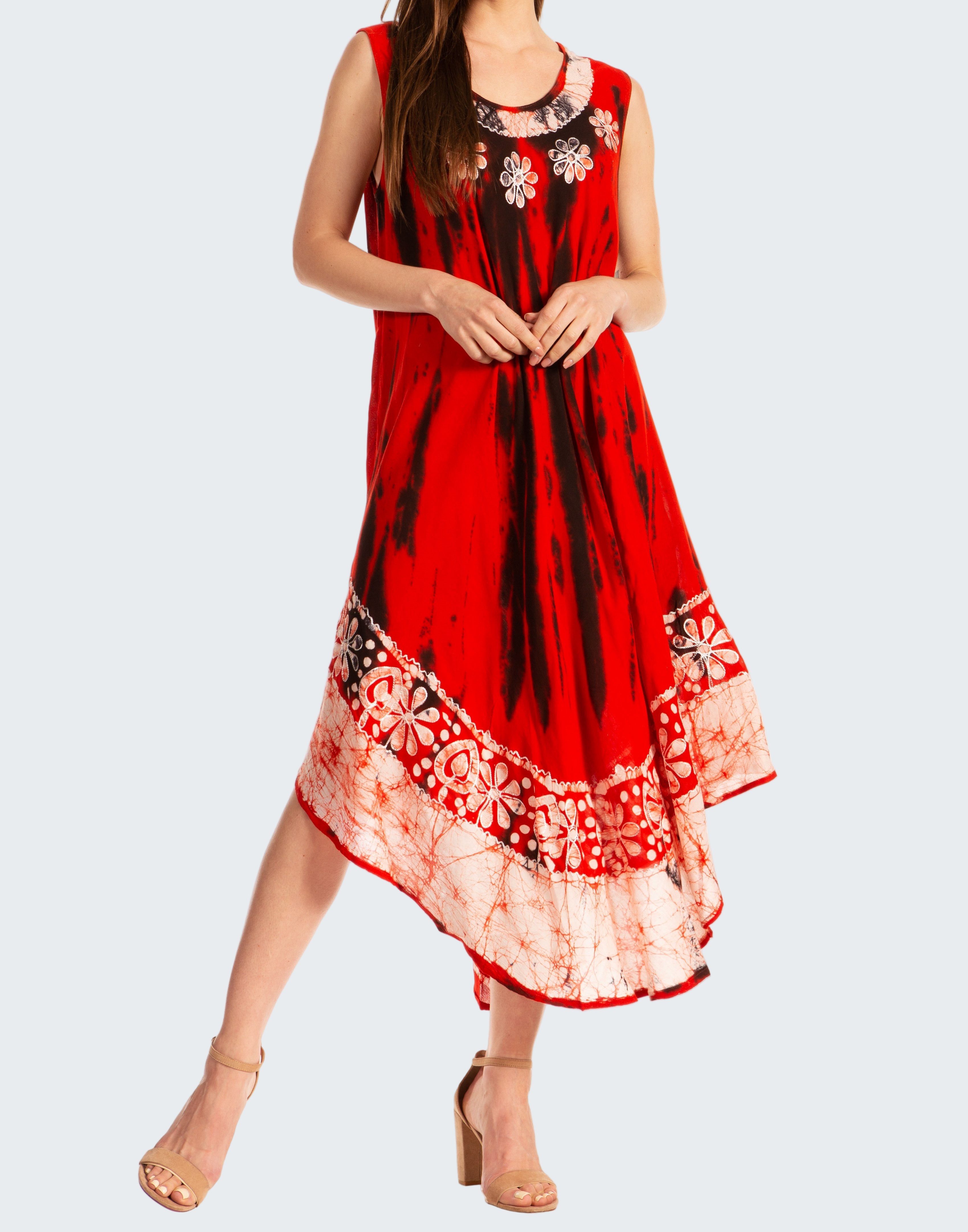 Red and black patterned dress worn by a model on a white background