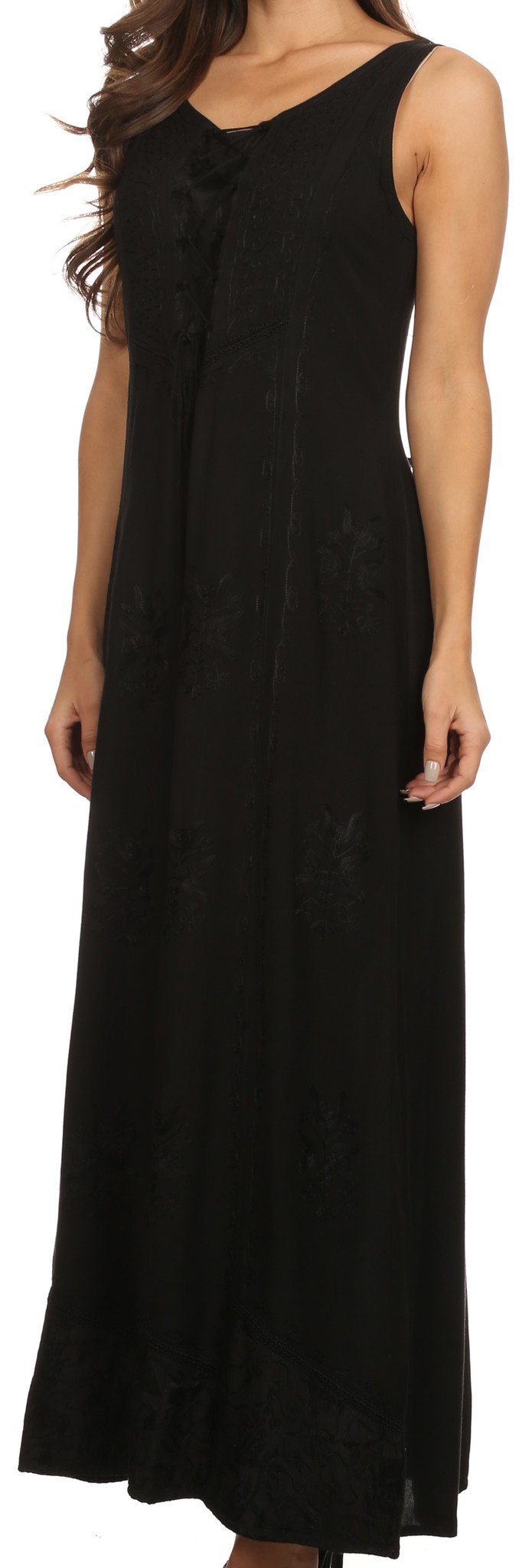 Black sleeveless dress worn by a model against a neutral background