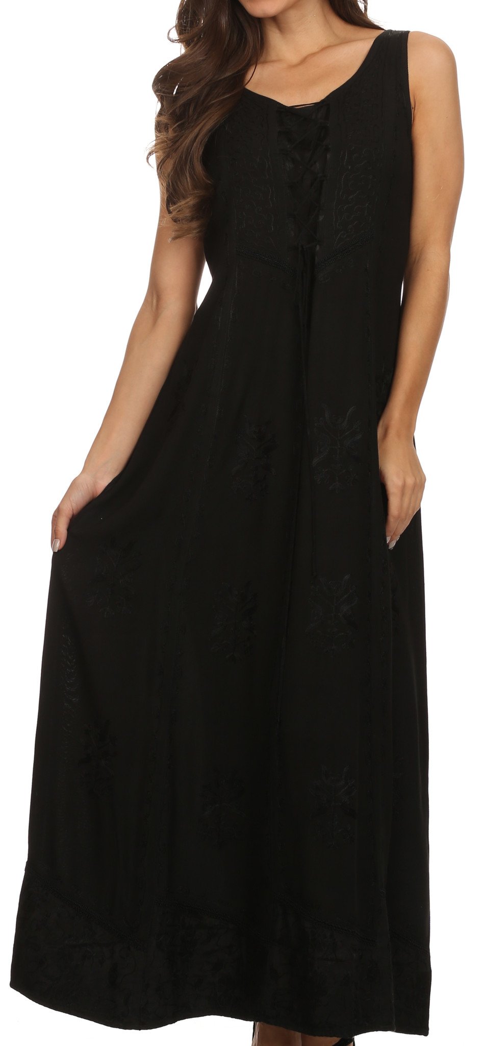 Black sleeveless dress worn by a model on a white background